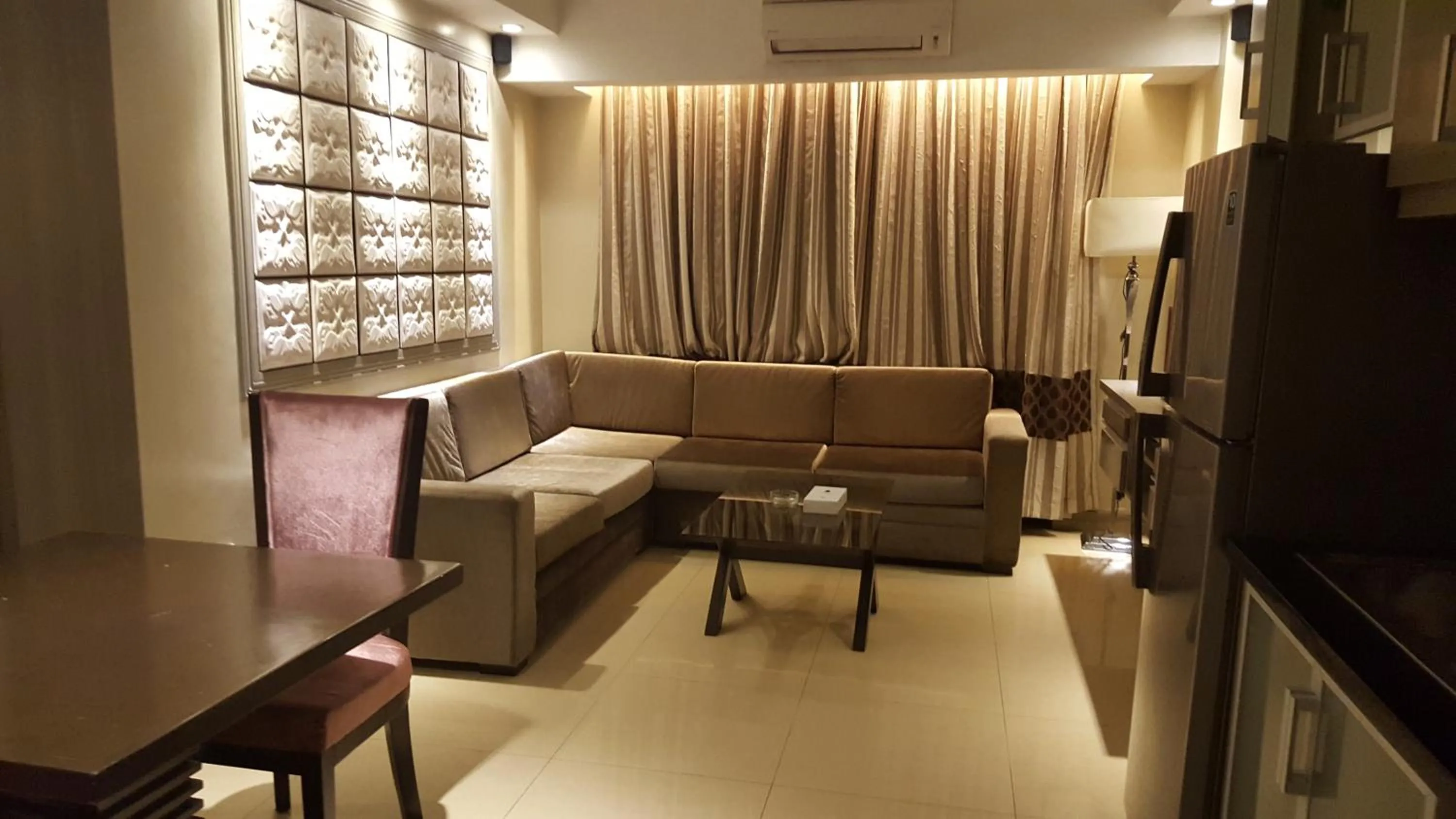 Living room in Prime Asia Hotel