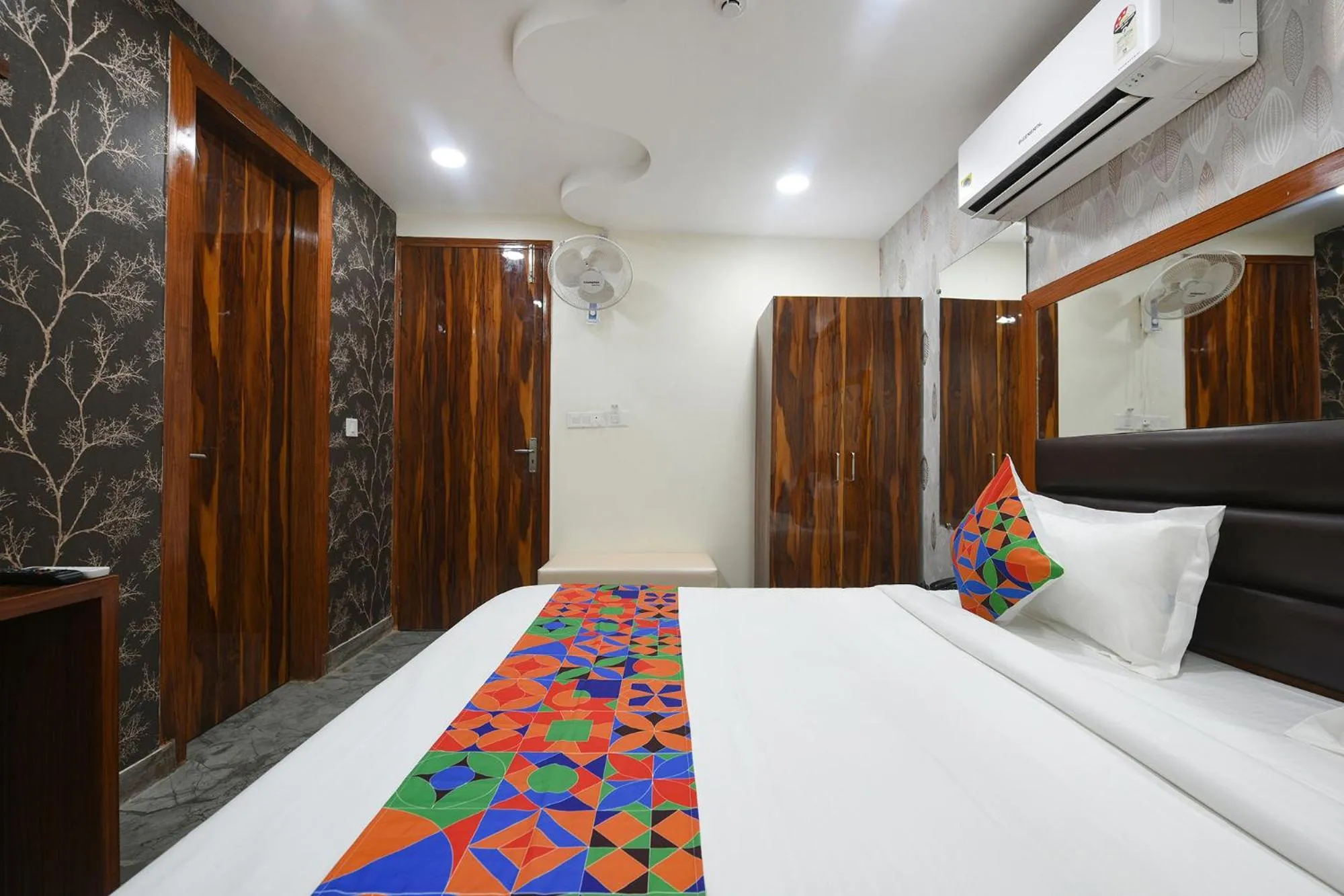 Bed in FabHotel Mona Continental - Nr Laxmi Nagar IT Hub
