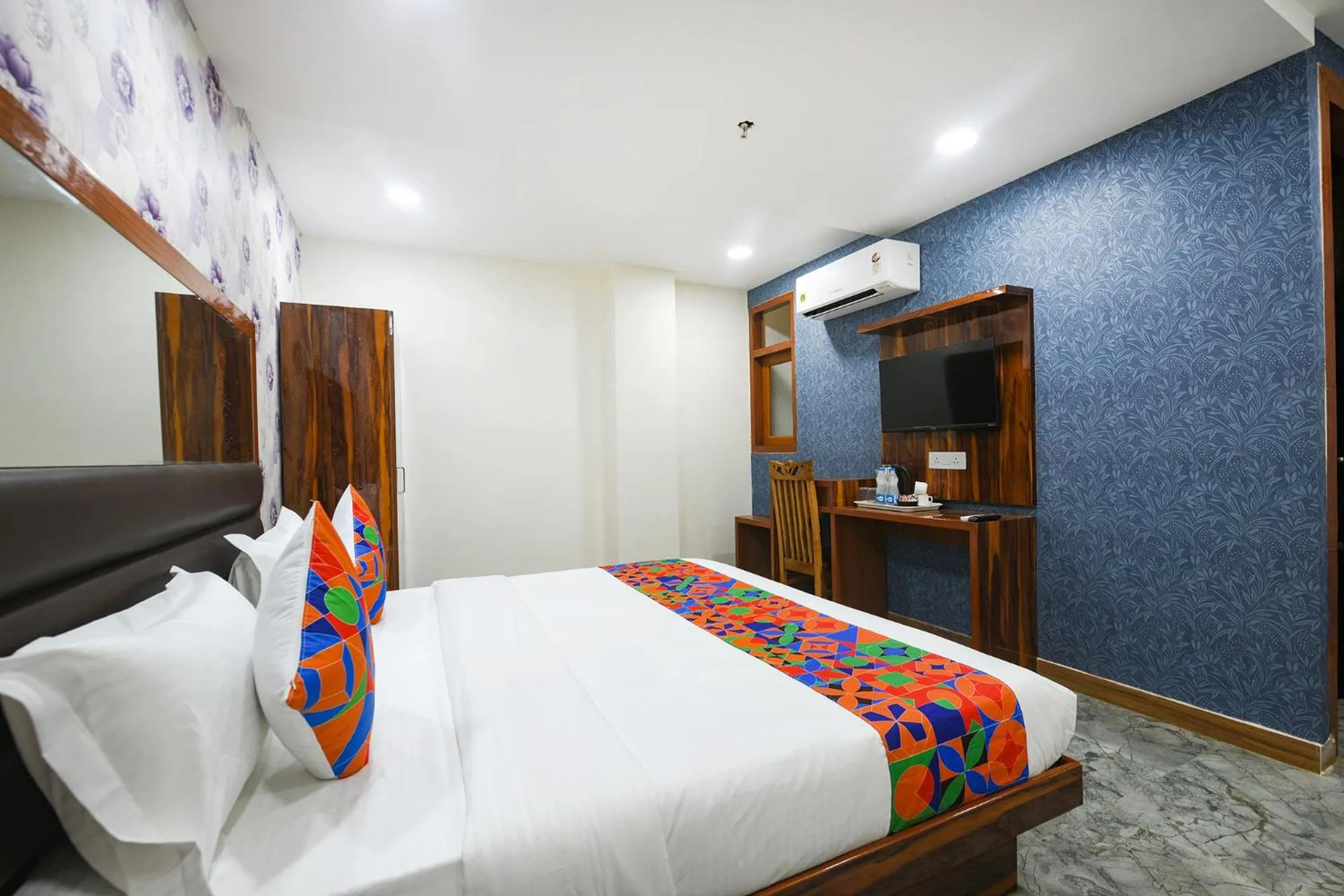 Bed in FabHotel Mona Continental - Nr Laxmi Nagar IT Hub