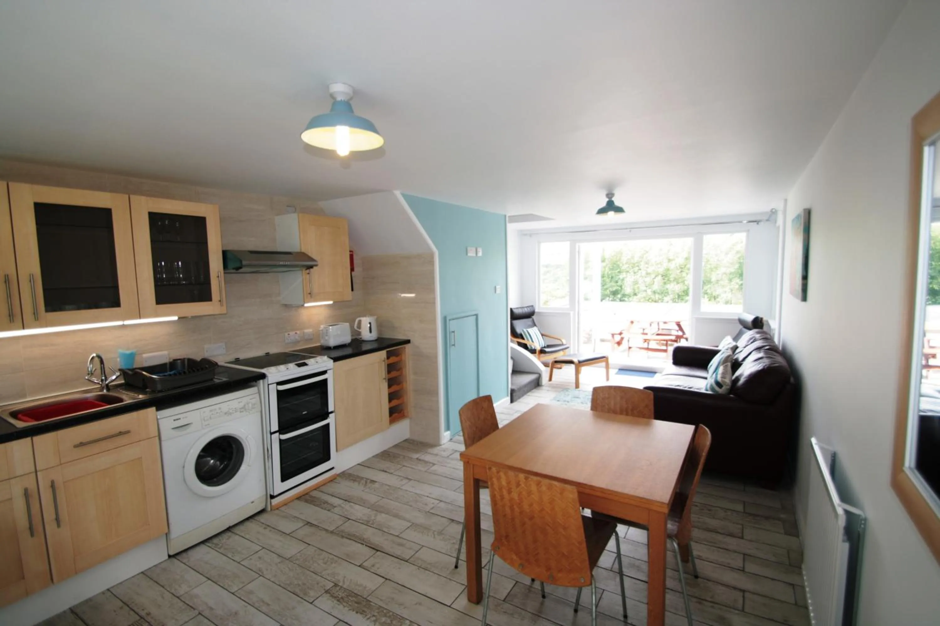 Kitchen or kitchenette in Freshwater Bay Holiday Cottages