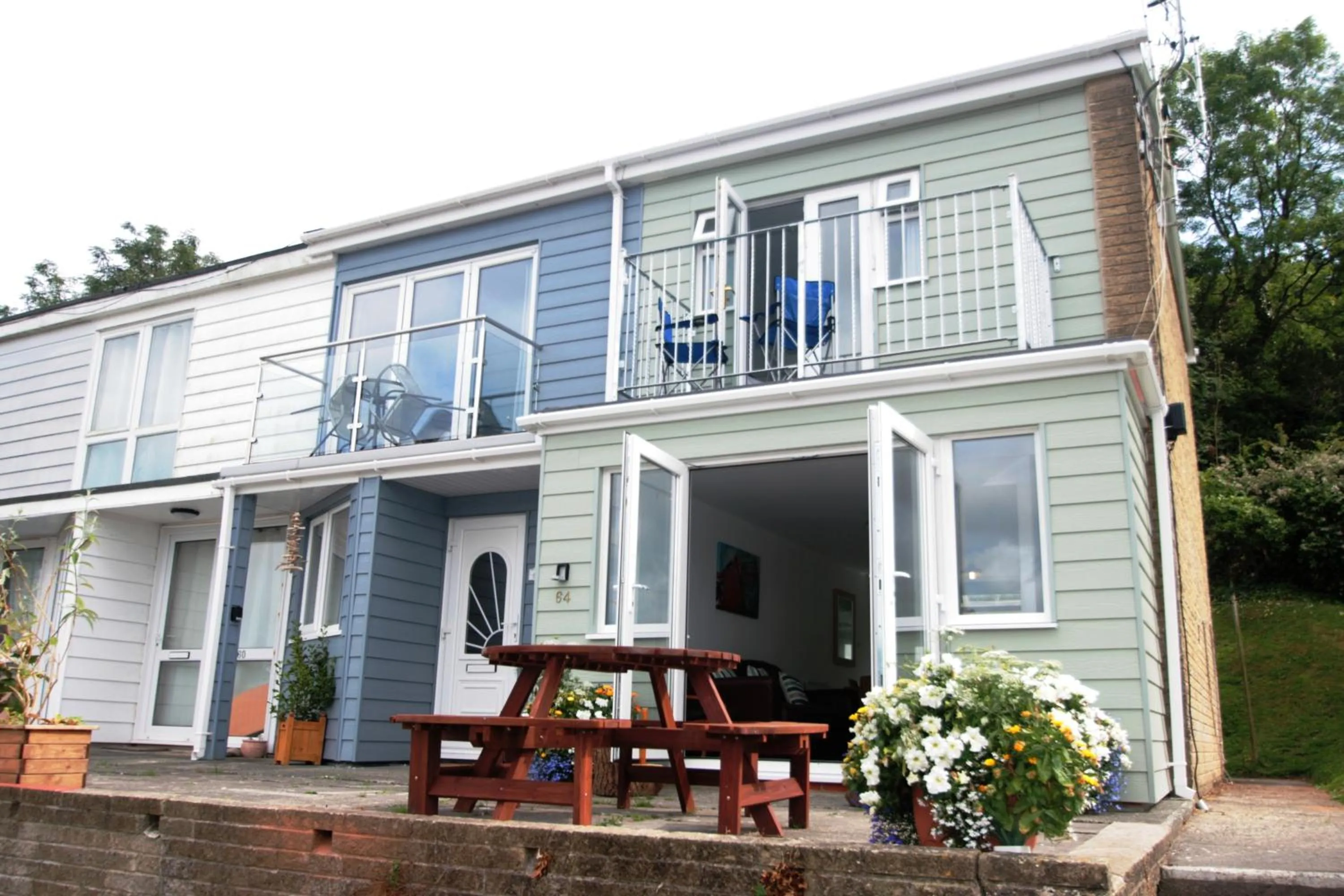 Property building in Freshwater Bay Holiday Cottages