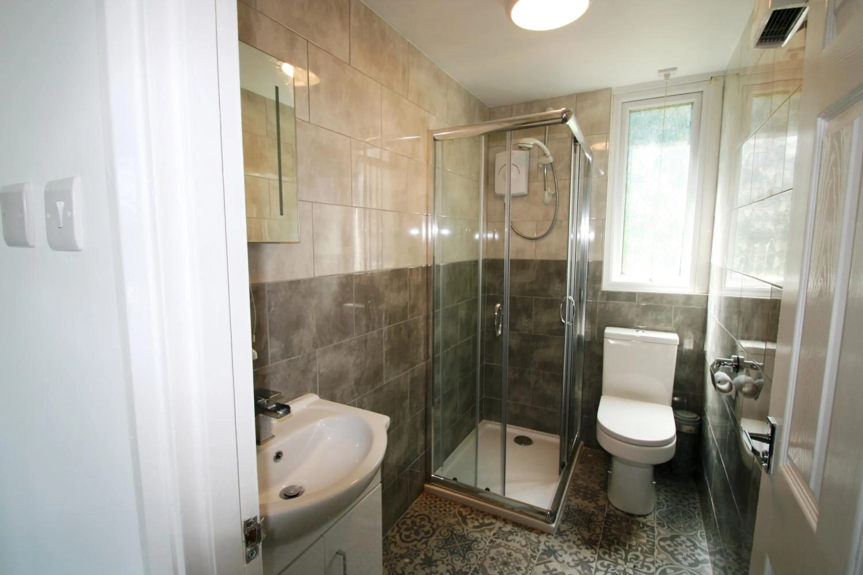 Shower in Freshwater Bay Holiday Cottages
