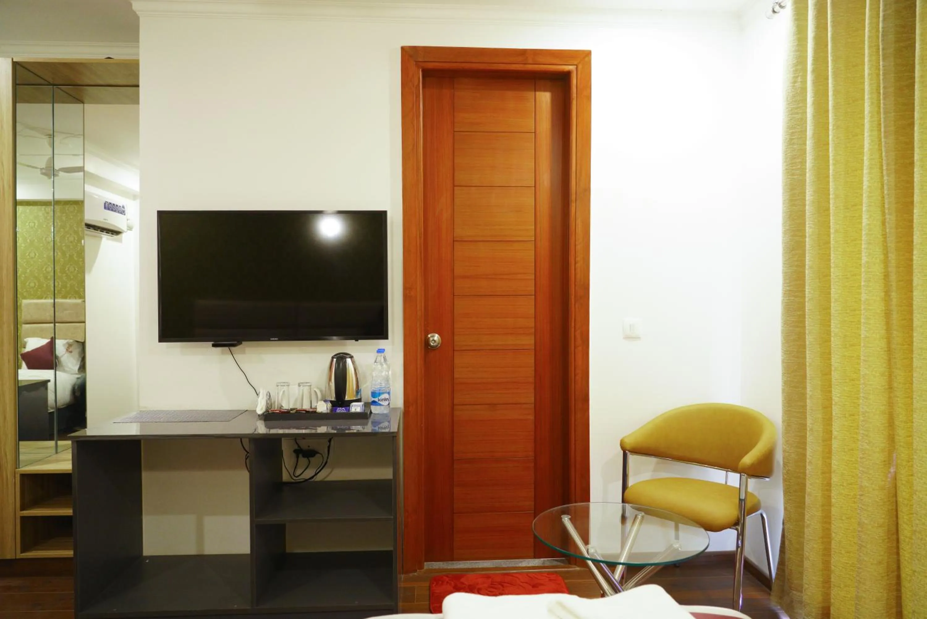 Communal lounge/ TV room in Lime Tree Hotel Pulkit Gurgaon-Artemis Hospital, Nearest Metro Huda City Centre