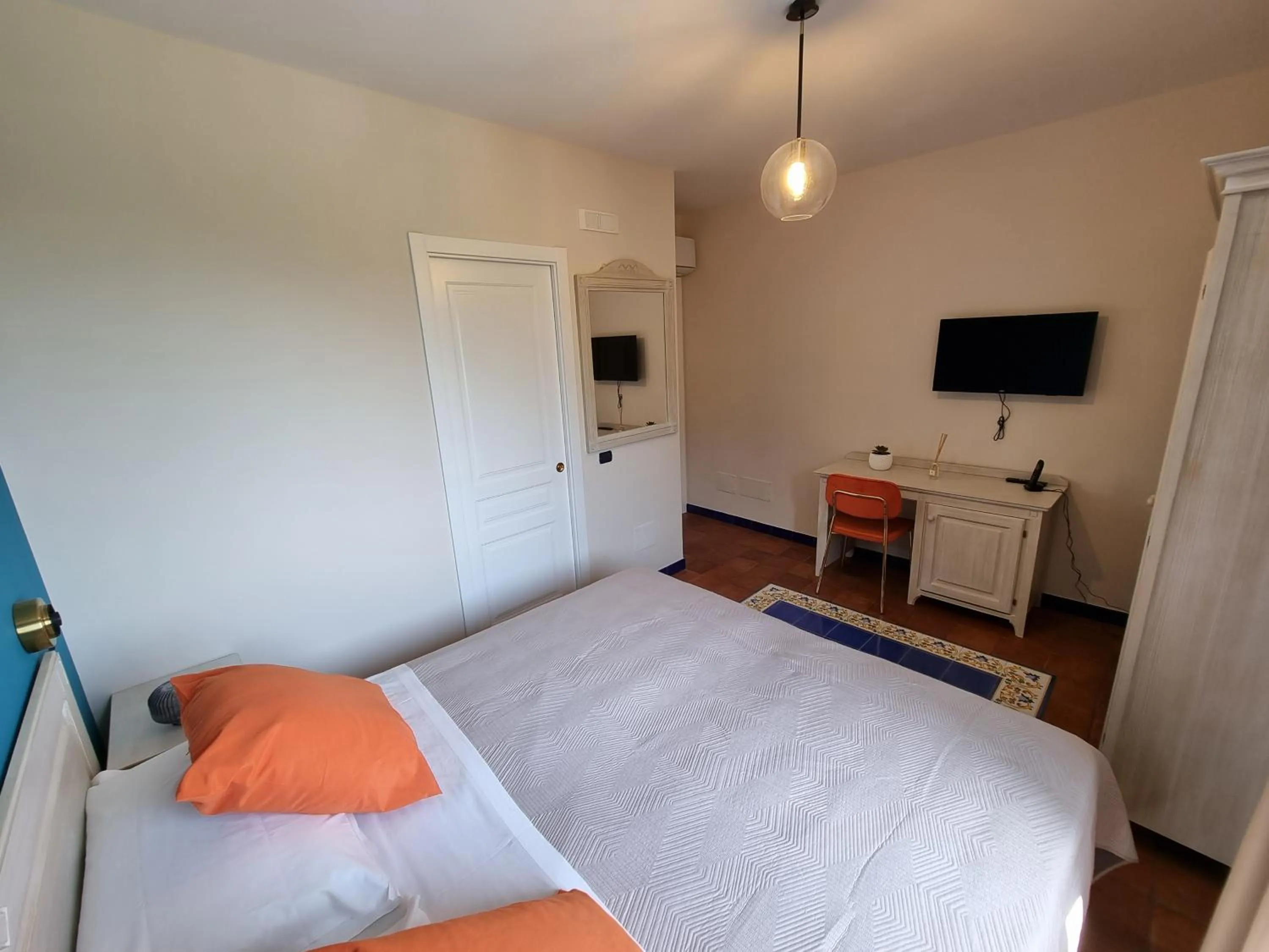 Bed in Casa Fifina Rooms