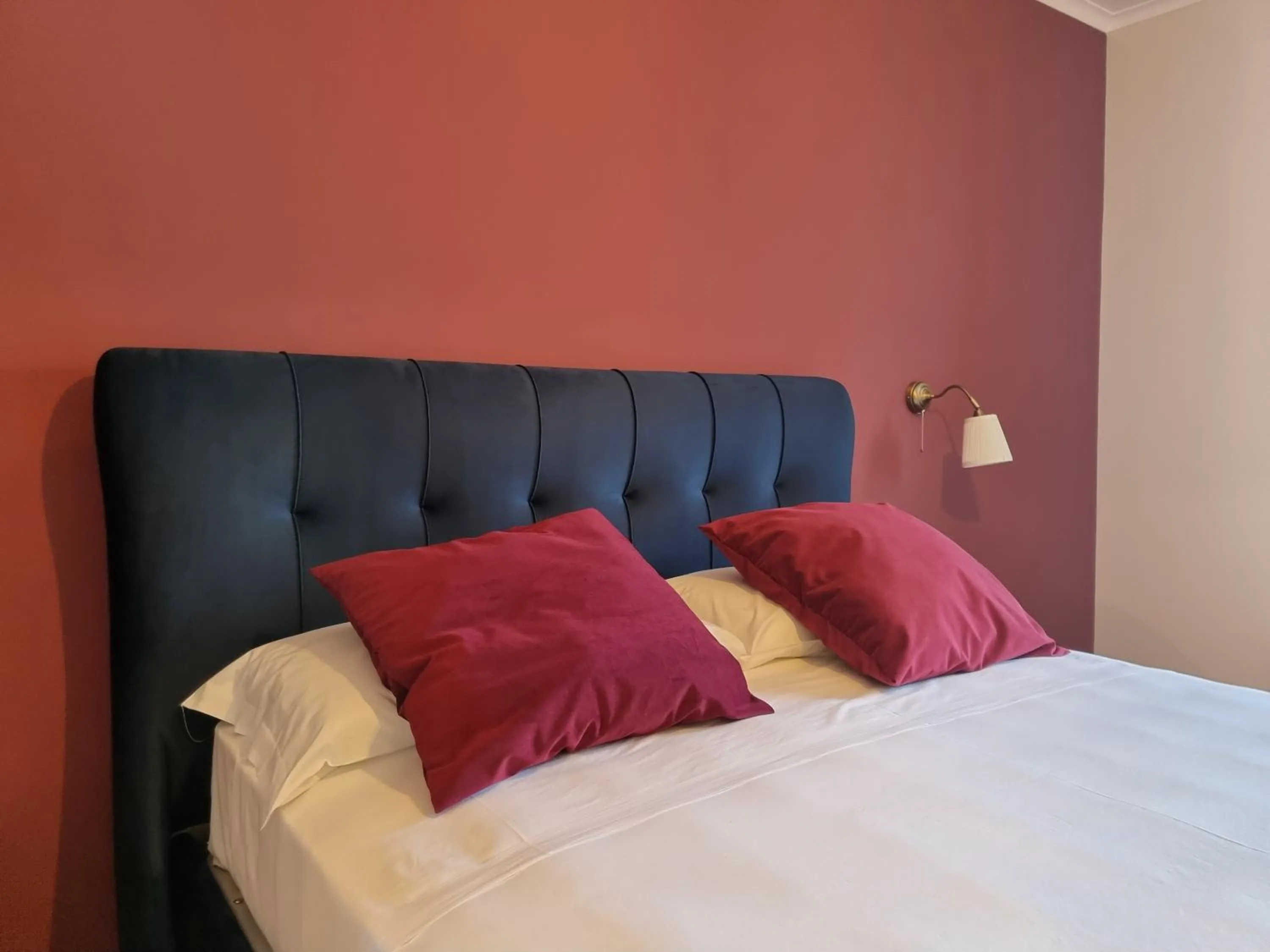 Bed in Casa Fifina Rooms