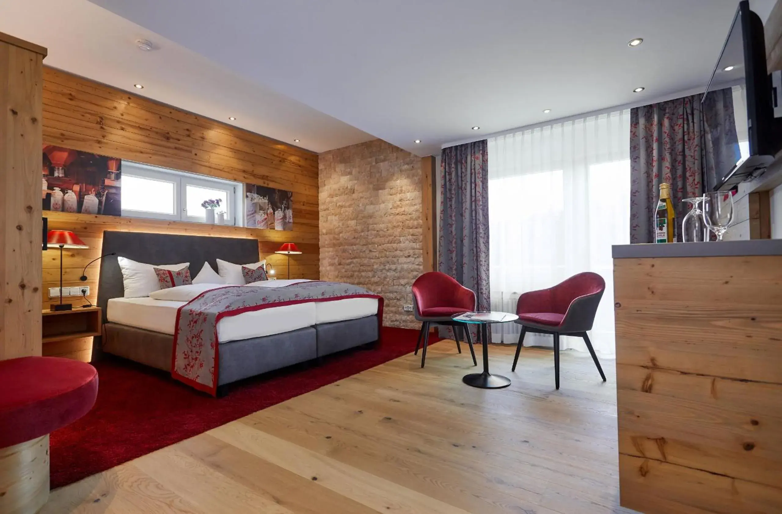 Deluxe Double Room with Balcony - single occupancy in Romantik Hotel Rindenmühle Deluxe Double Room with Balcony - single occupancy in Romantik Hotel Rindenmühle