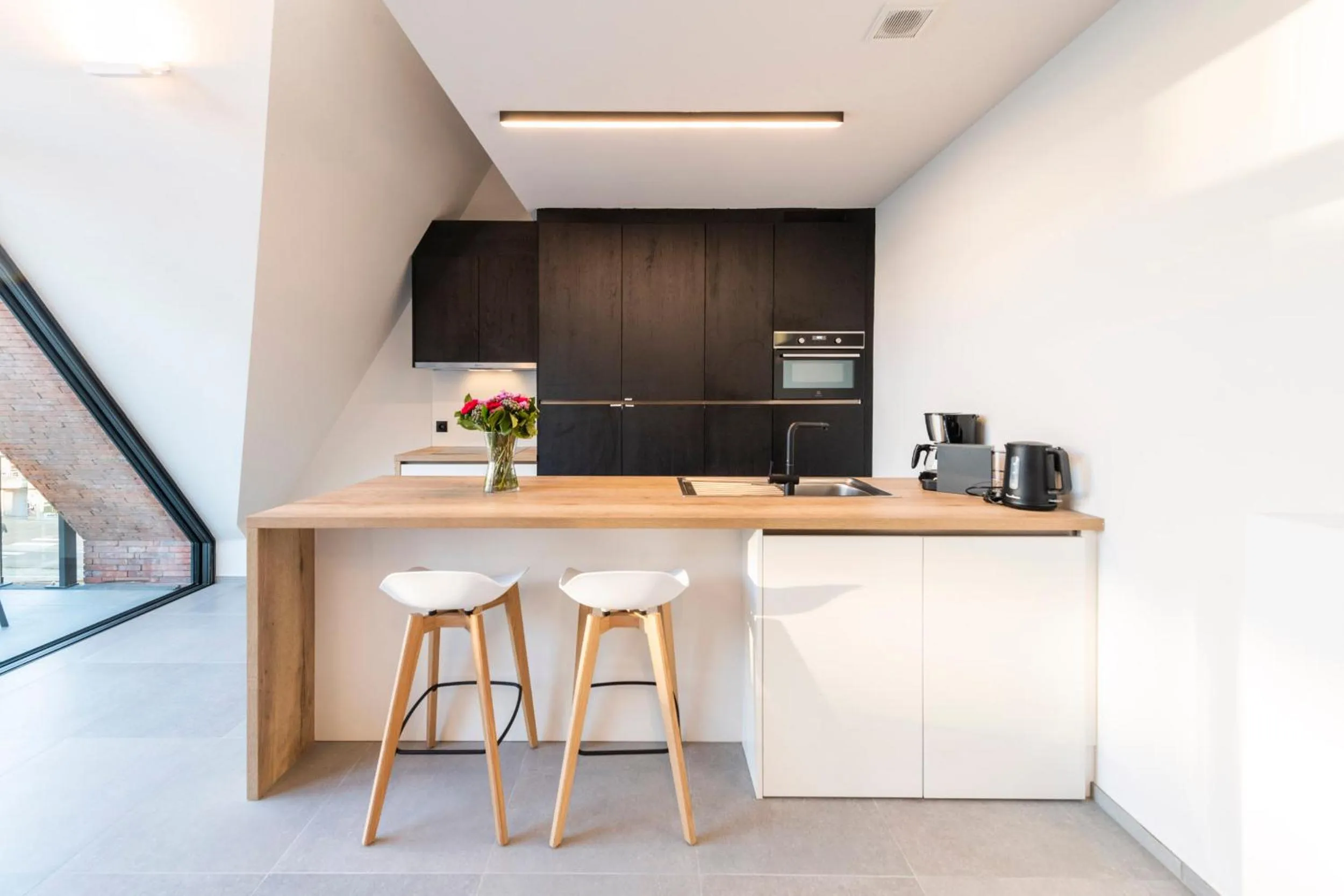 kitchen in Belcasa Beach Suites & Lofts Aparthotel