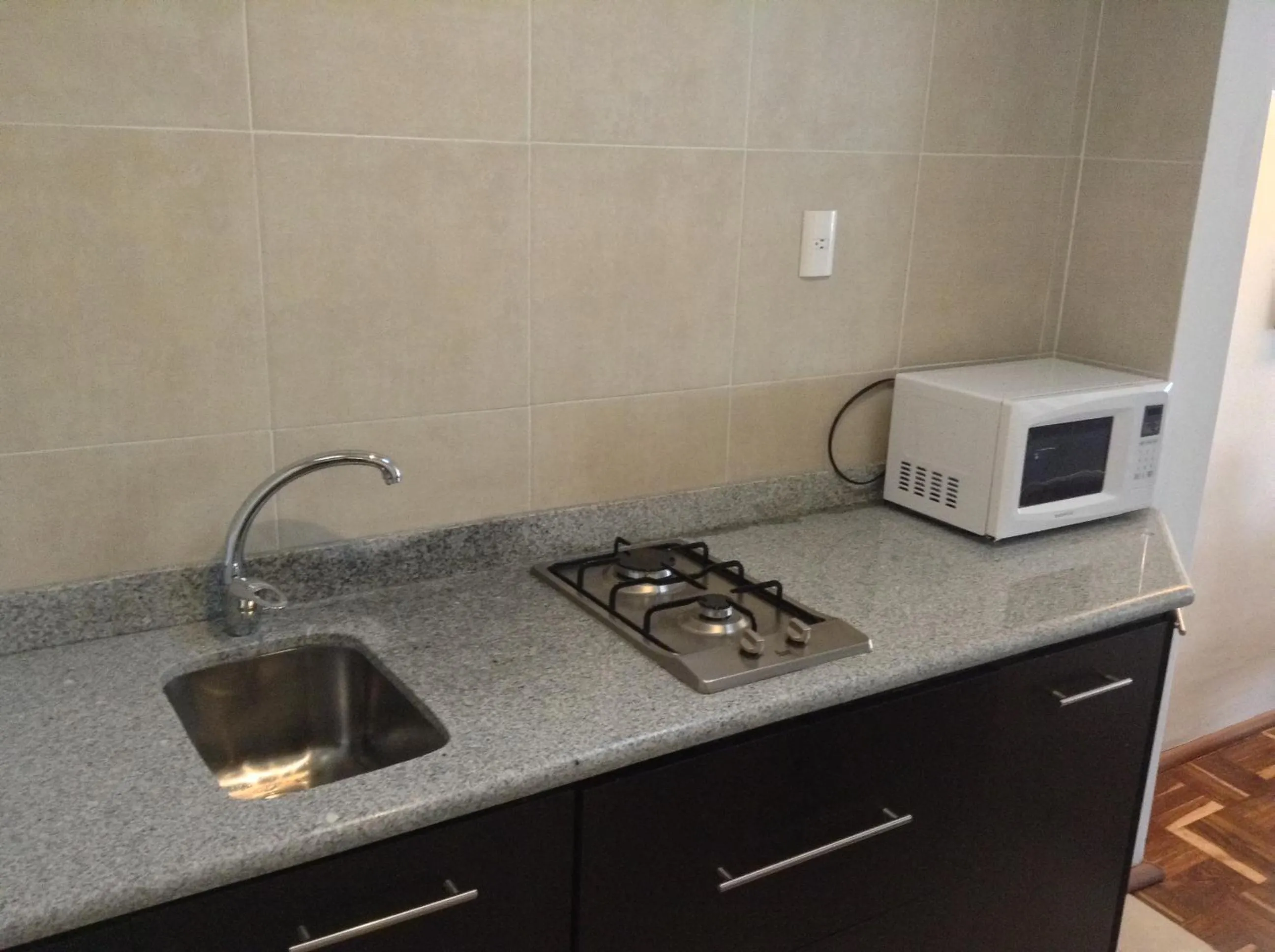 Kitchen or kitchenette in Suites Havre