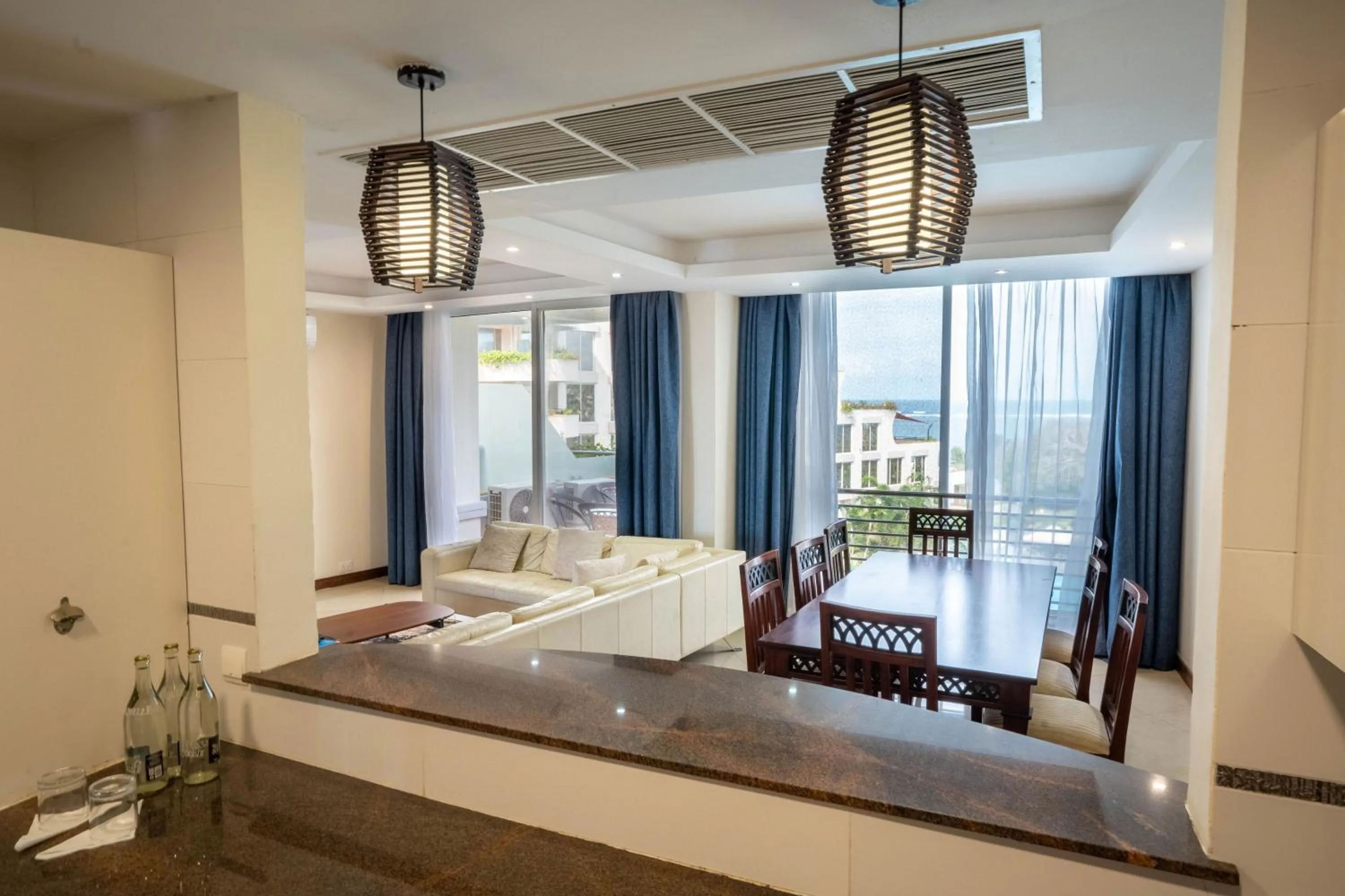 Living room, Bed in Kilua Residences by CityBlue, Mombasa