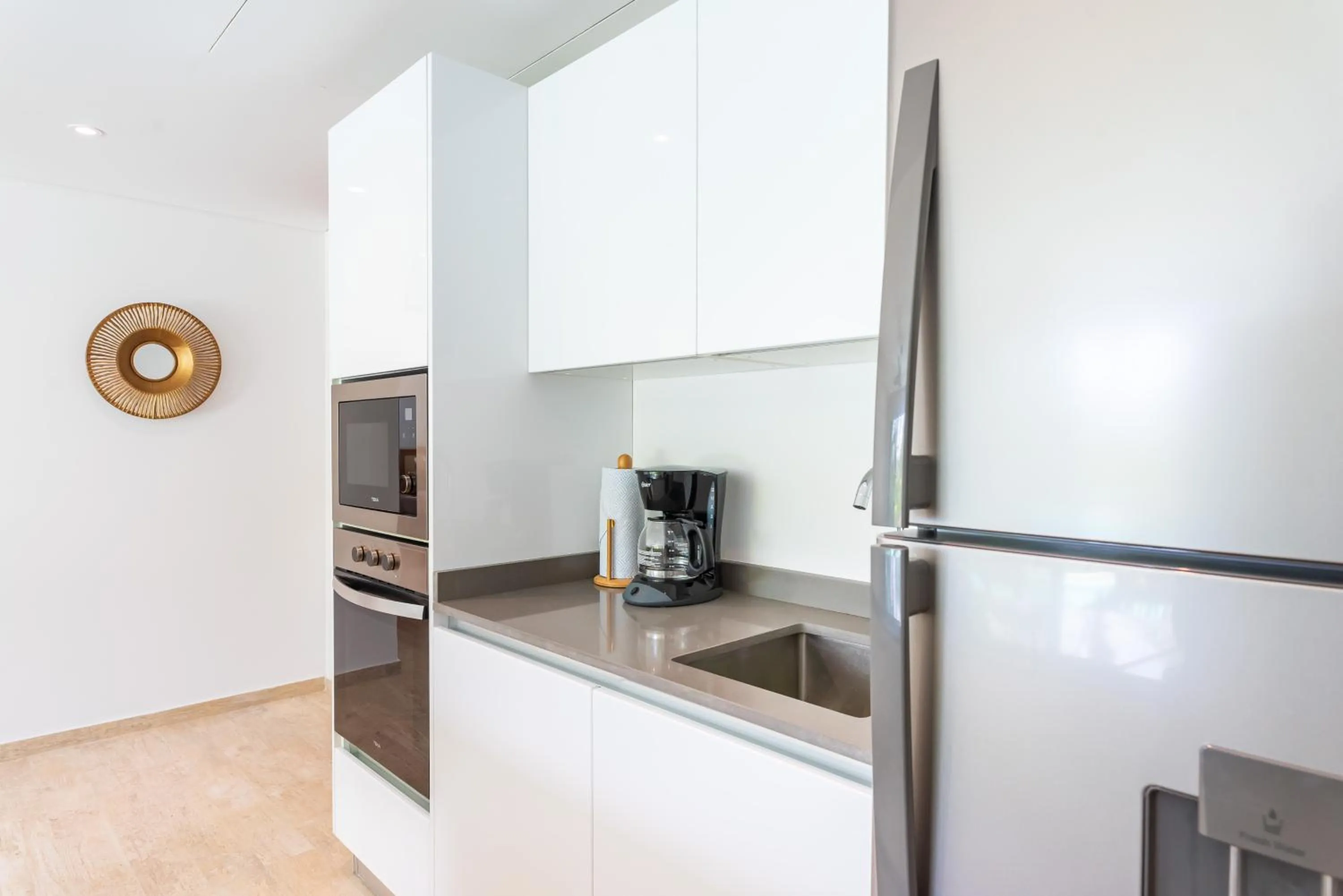 Kitchen or kitchenette in Central Park Lagunas by Sandy Powerful