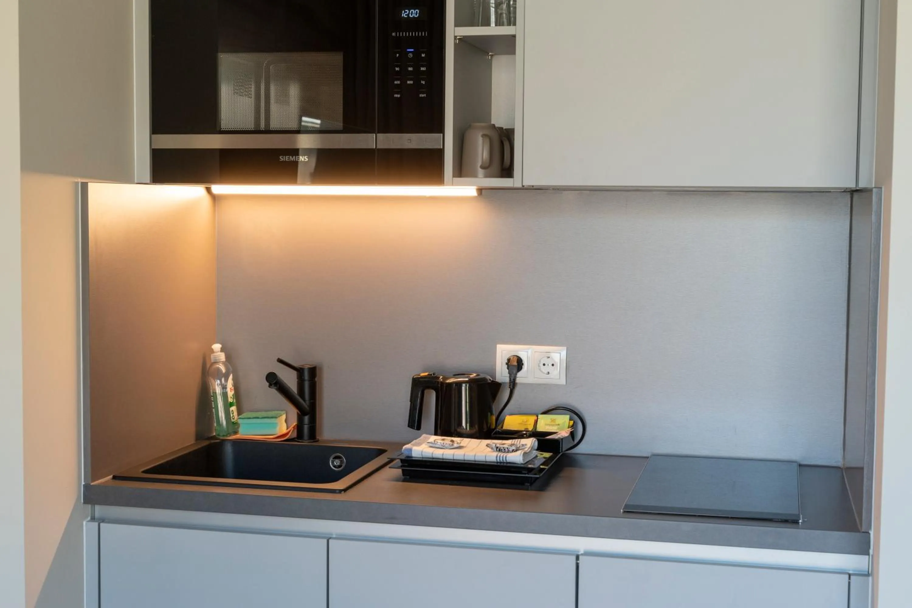 kitchen in Pakat Suites