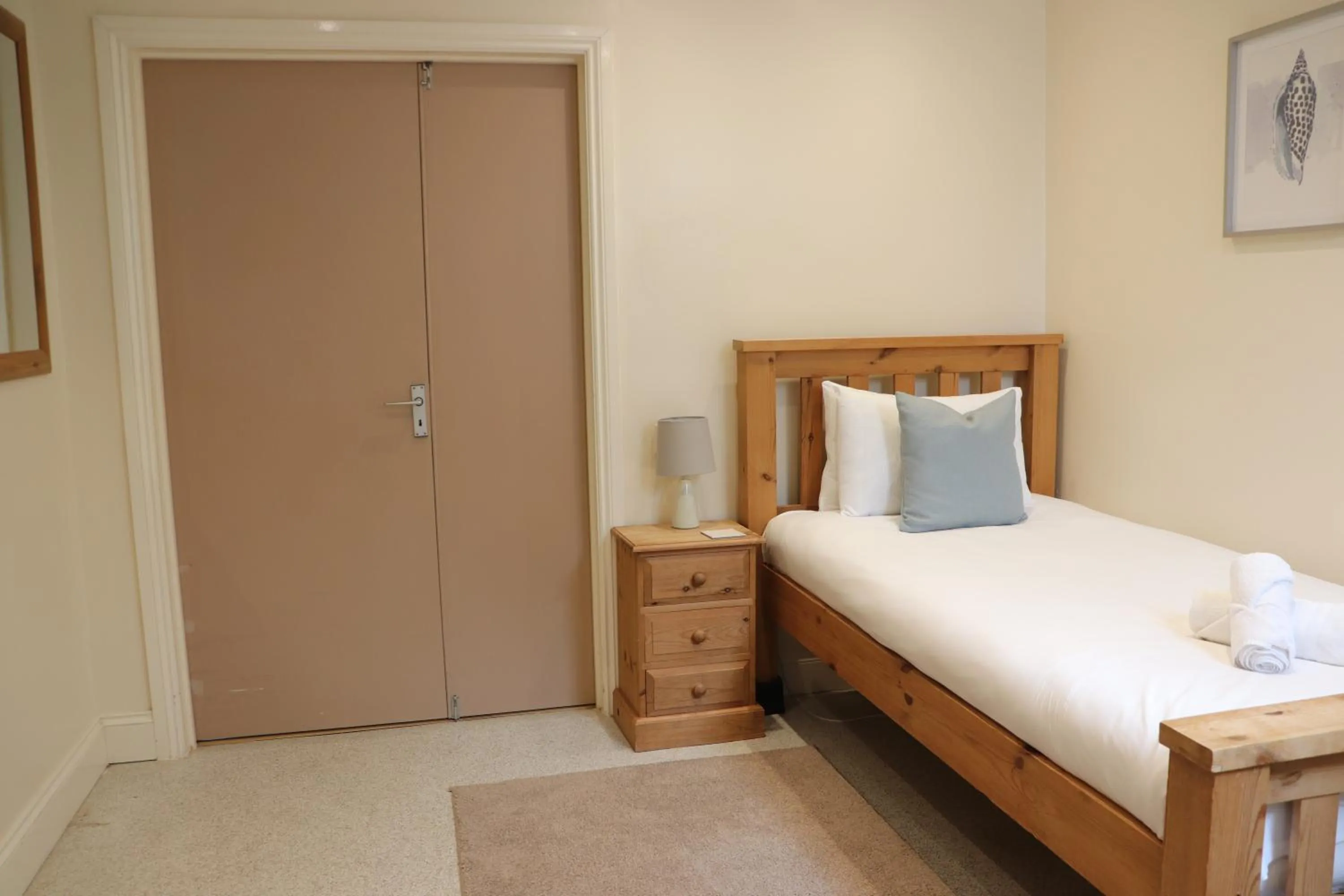 Bed in Glyndley Manor Cottages