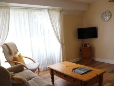 Bed in Glyndley Manor Cottages