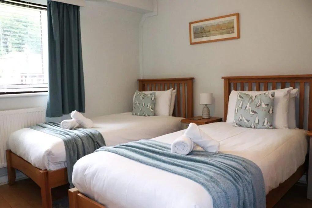 Bed in Glyndley Manor Cottages