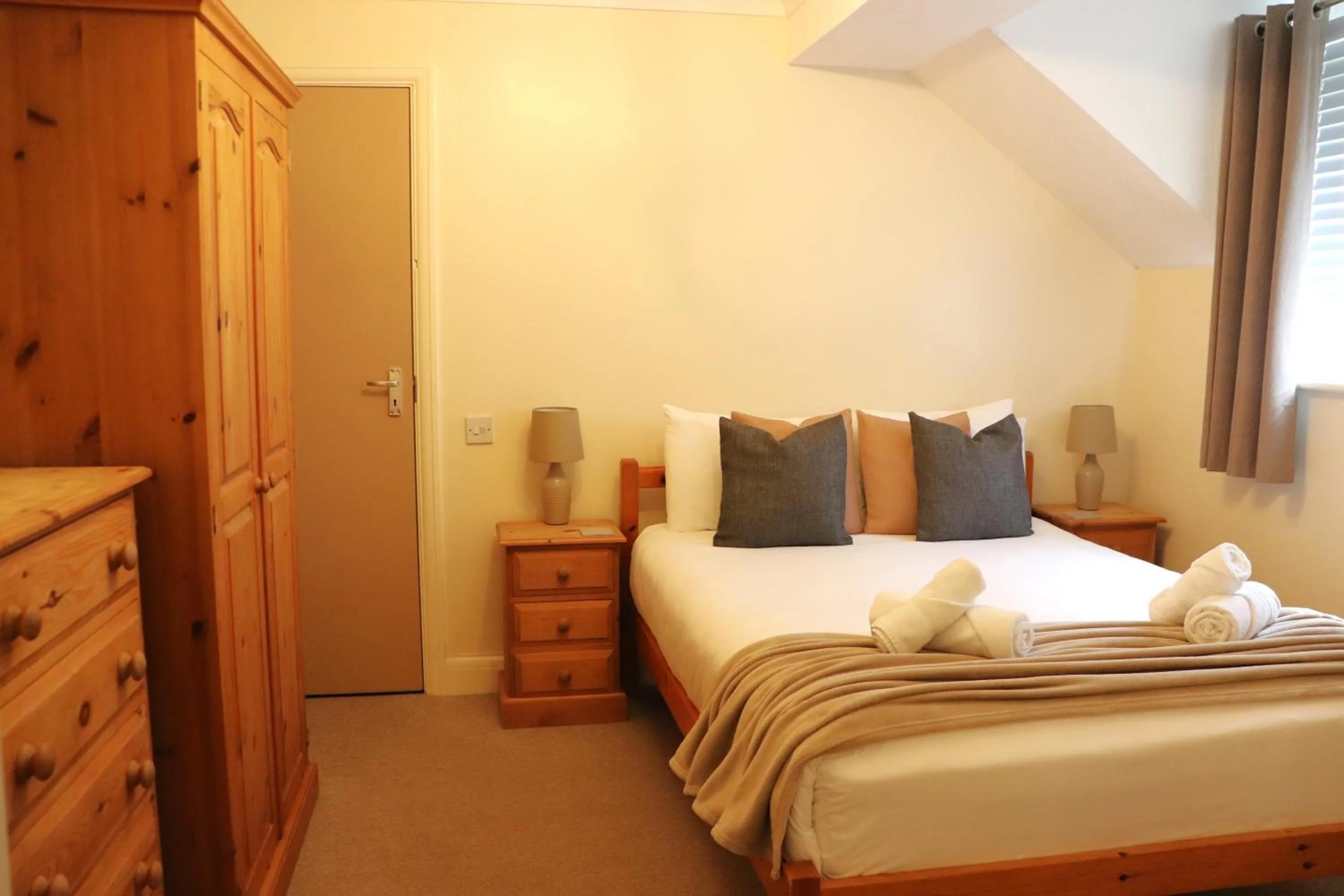 Bed in Glyndley Manor Cottages