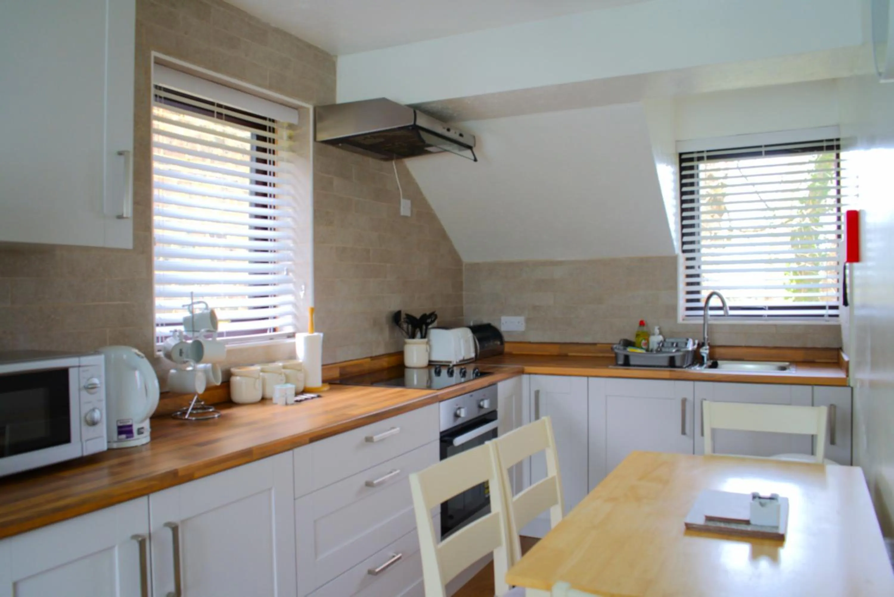 Kitchen or kitchenette in Glyndley Manor Cottages