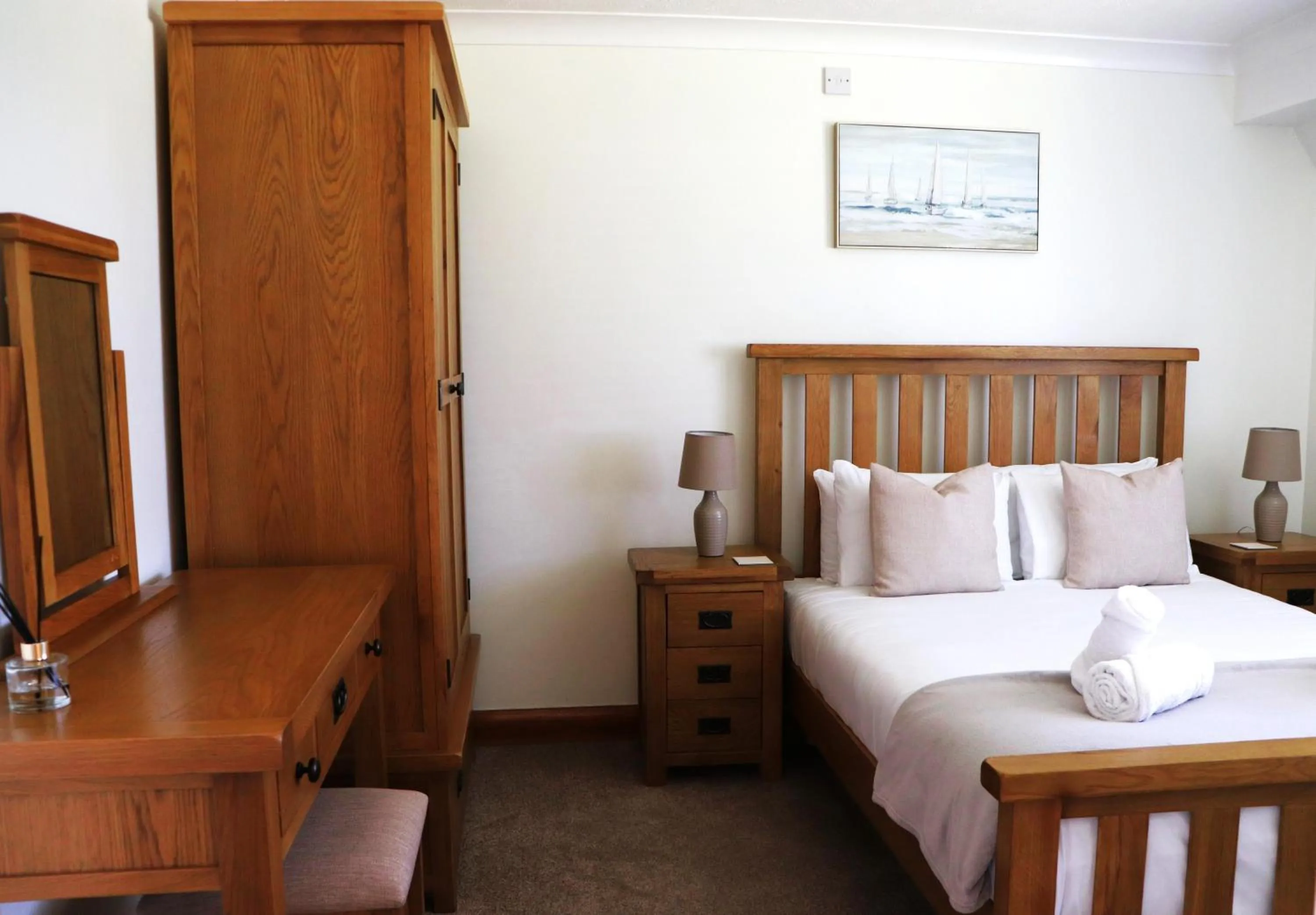 Bed in Glyndley Manor Cottages