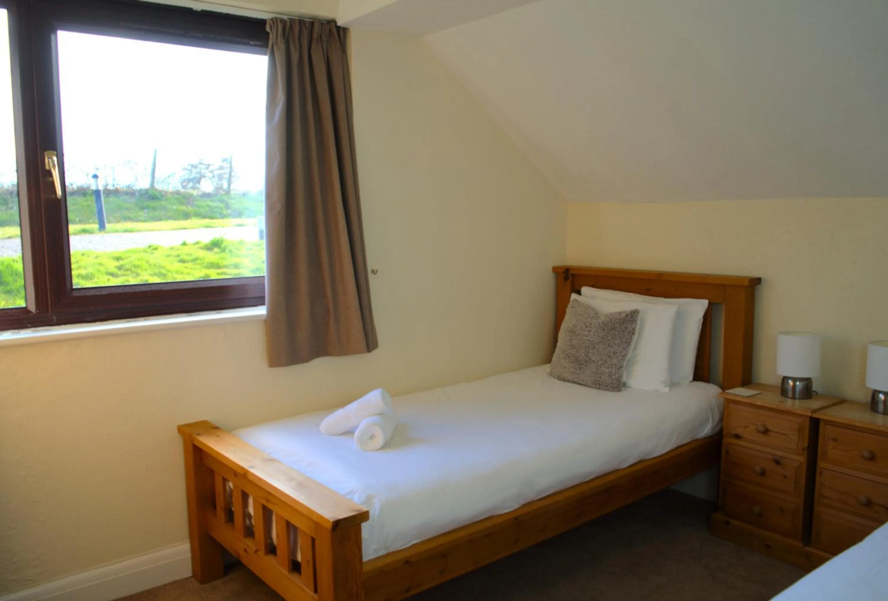 Bed in Glyndley Manor Cottages