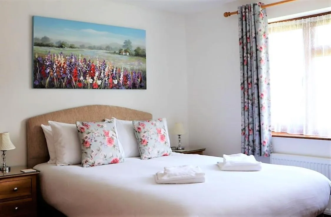 Bedroom, Bed in Glyndley Manor Cottages