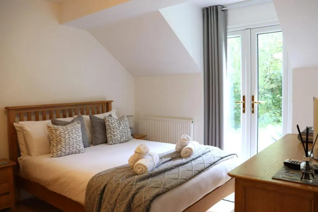 Bed in Glyndley Manor Cottages