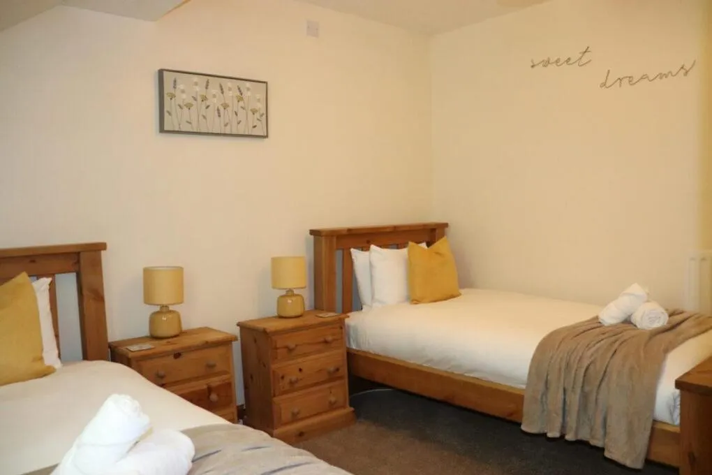 Bed in Glyndley Manor Cottages