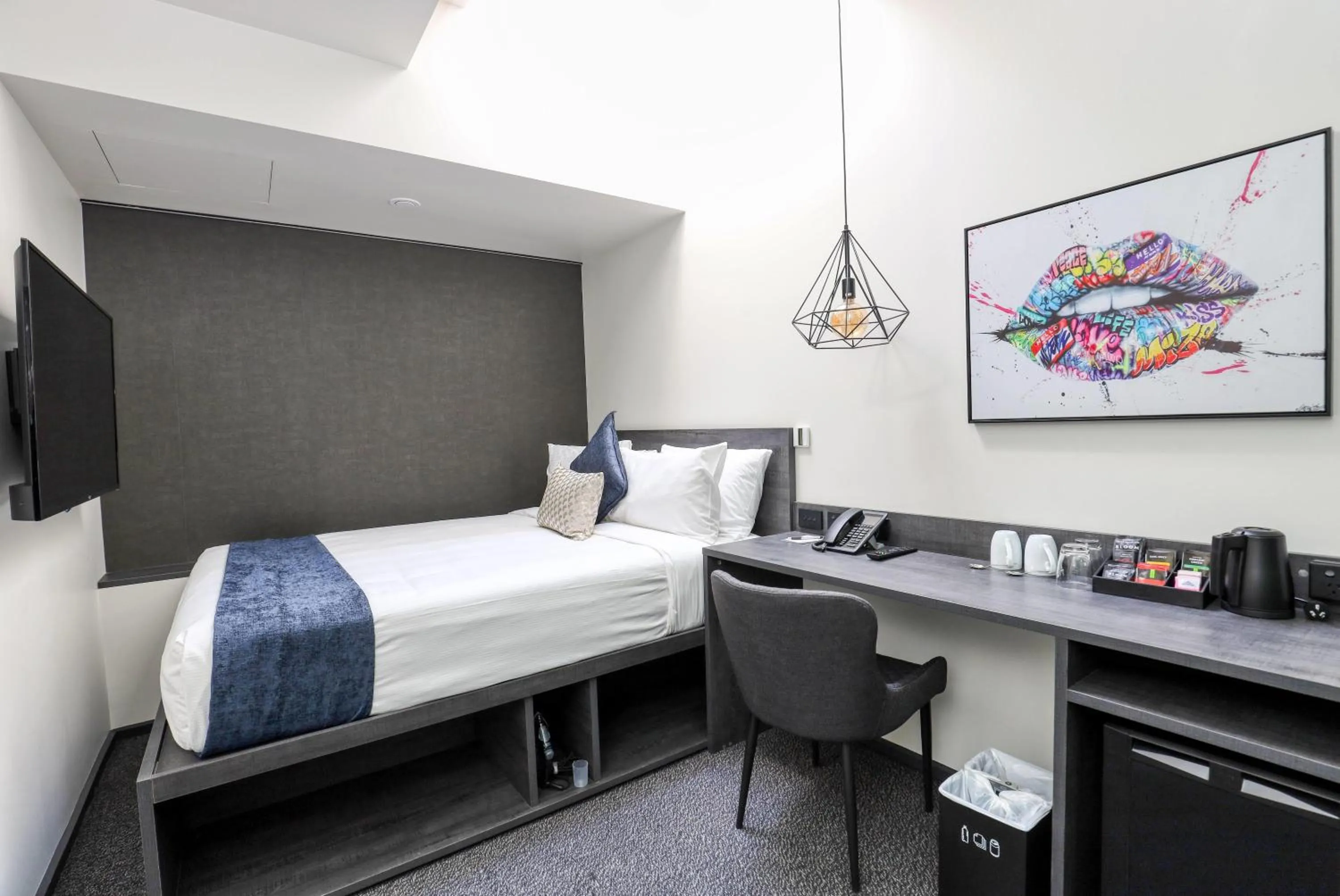 Photo of the whole room, Bed in Microtel by Wyndham Wellington