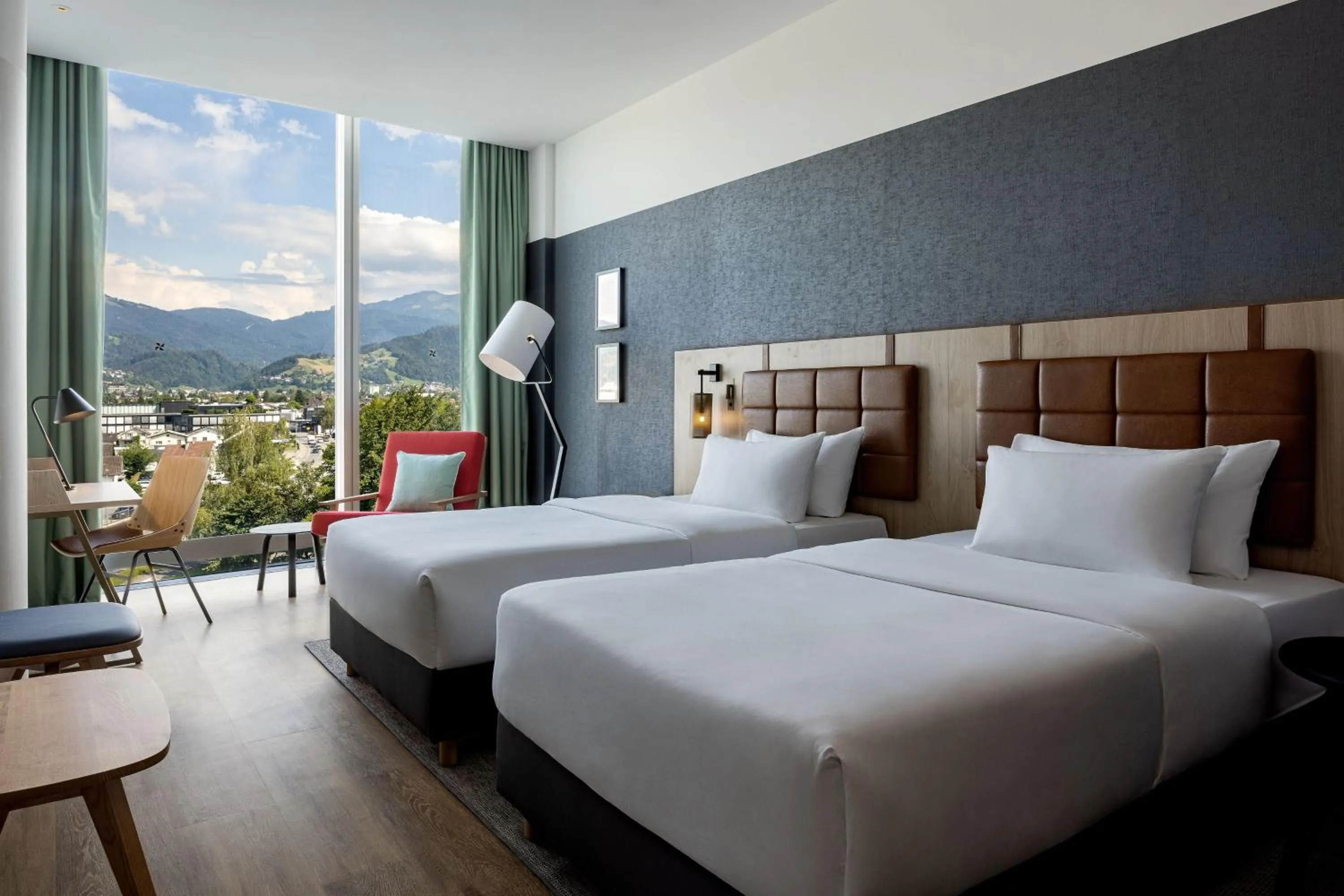 Photo of the whole room, Bed in Four Points by Sheraton Panoramahaus Dornbirn