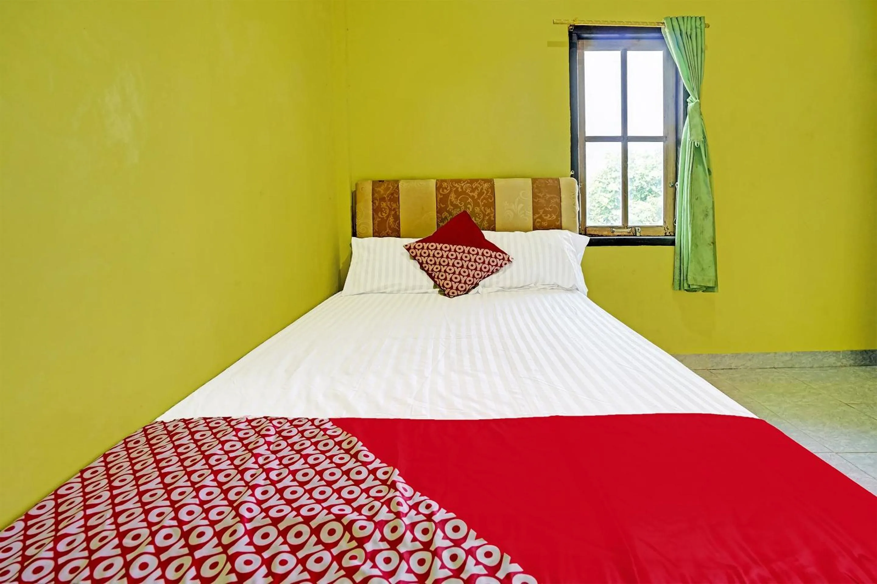 Bedroom in OYO 90508 Wisma Kenanga