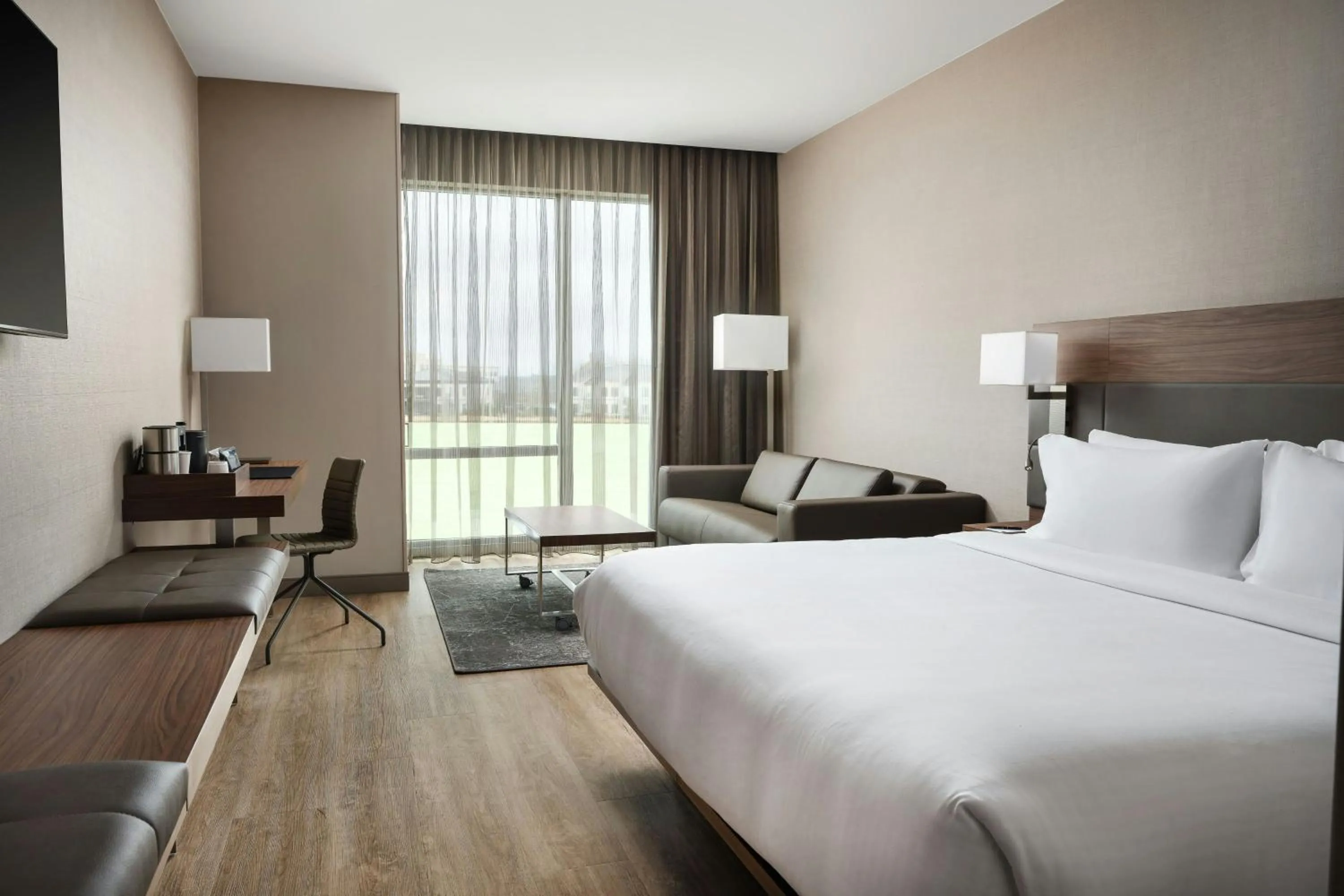 Photo of the whole room, Bed in AC Hotel by Marriott Jackson Ridgeland