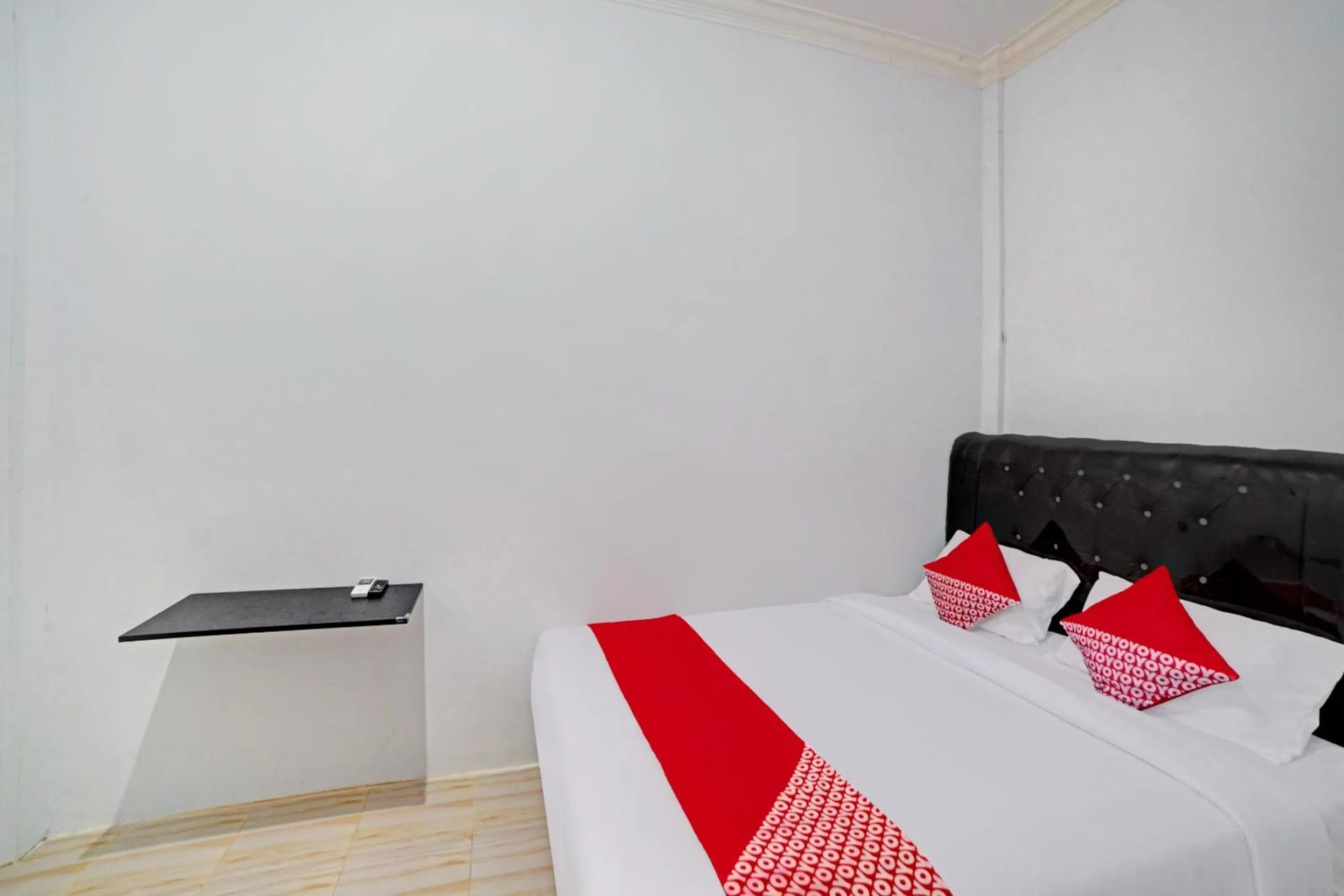 Bedroom in Hotel O Madina Residence Syariah