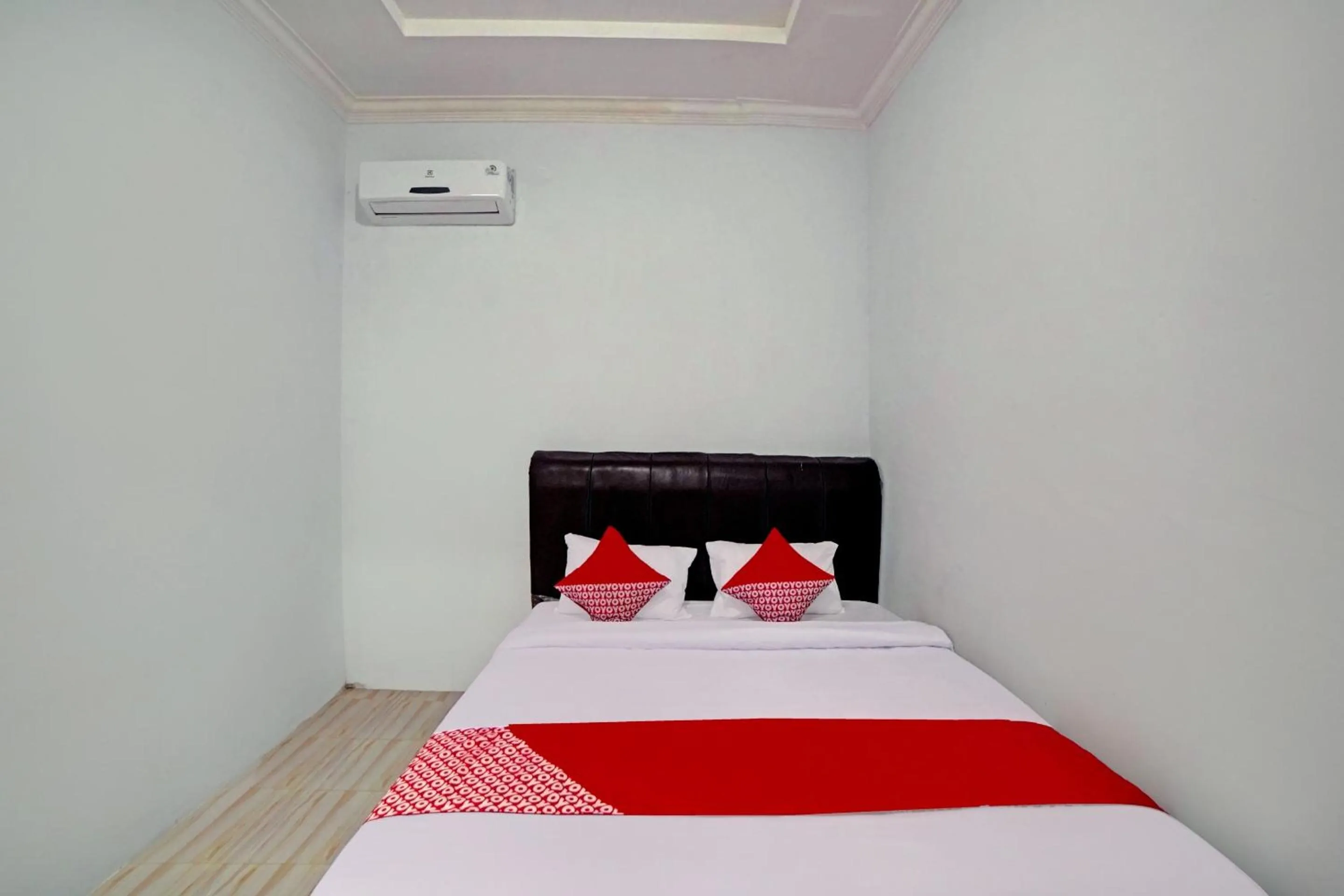 Bedroom in Hotel O Madina Residence Syariah