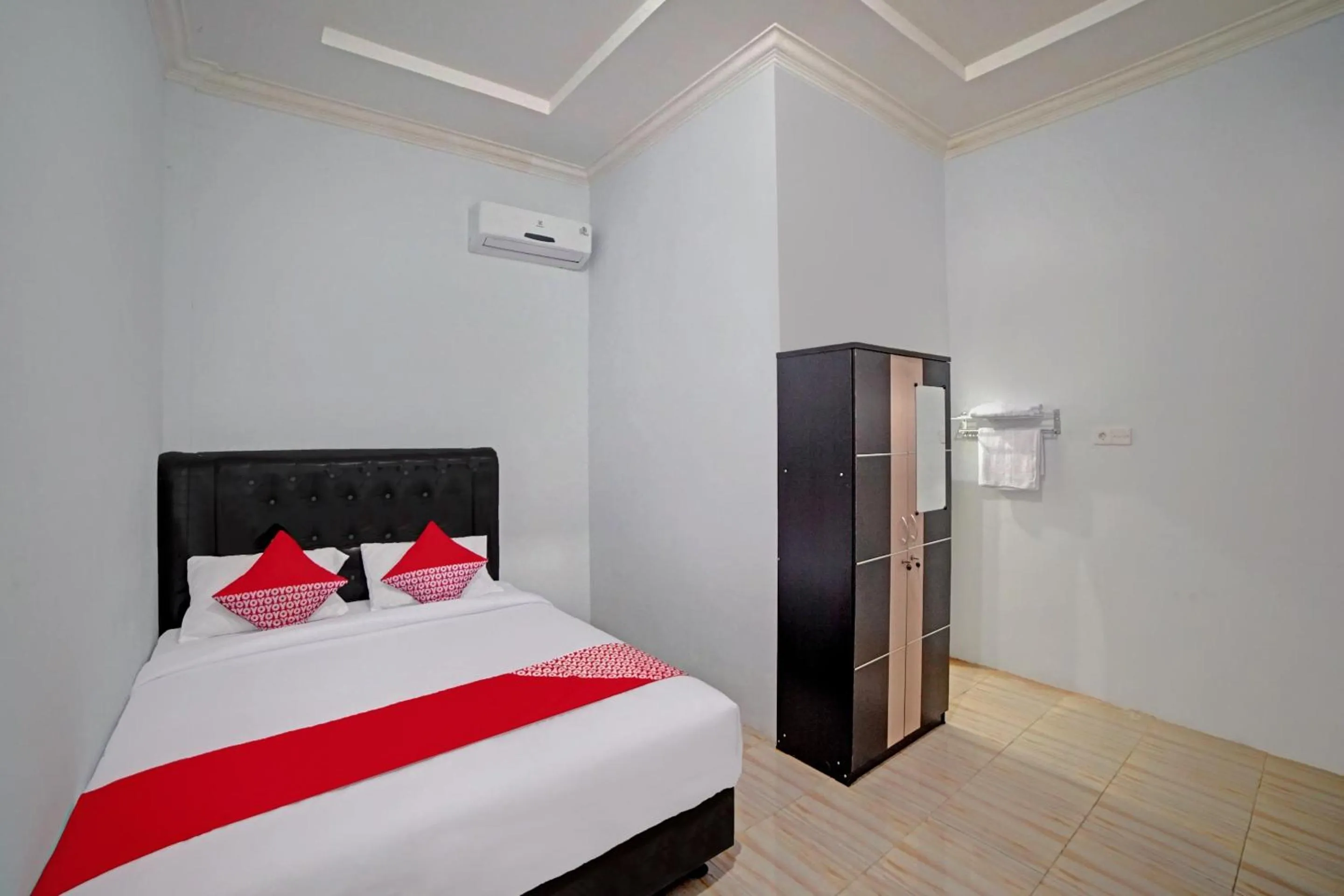 Bedroom in Hotel O Madina Residence Syariah