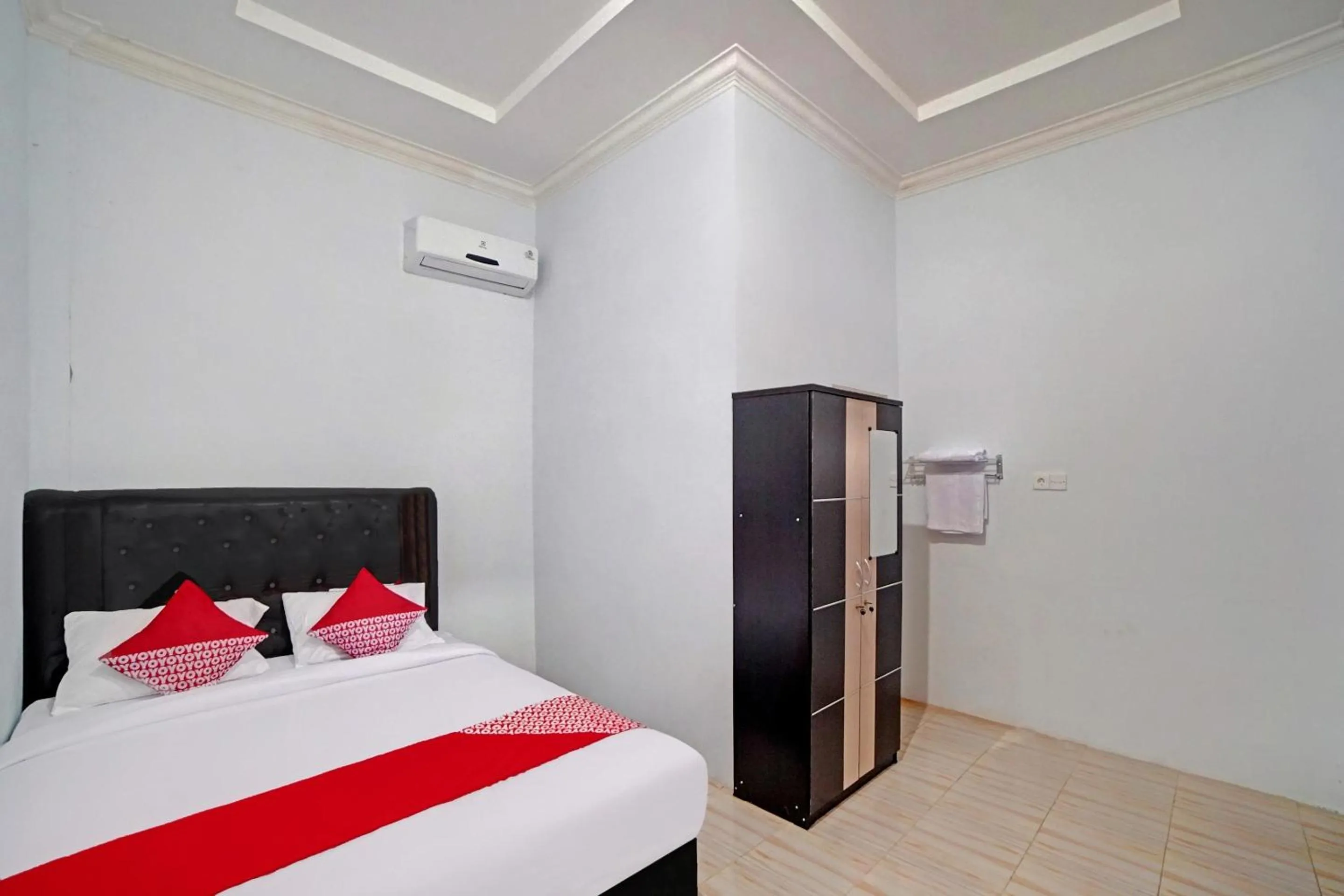 Bedroom in Hotel O Madina Residence Syariah
