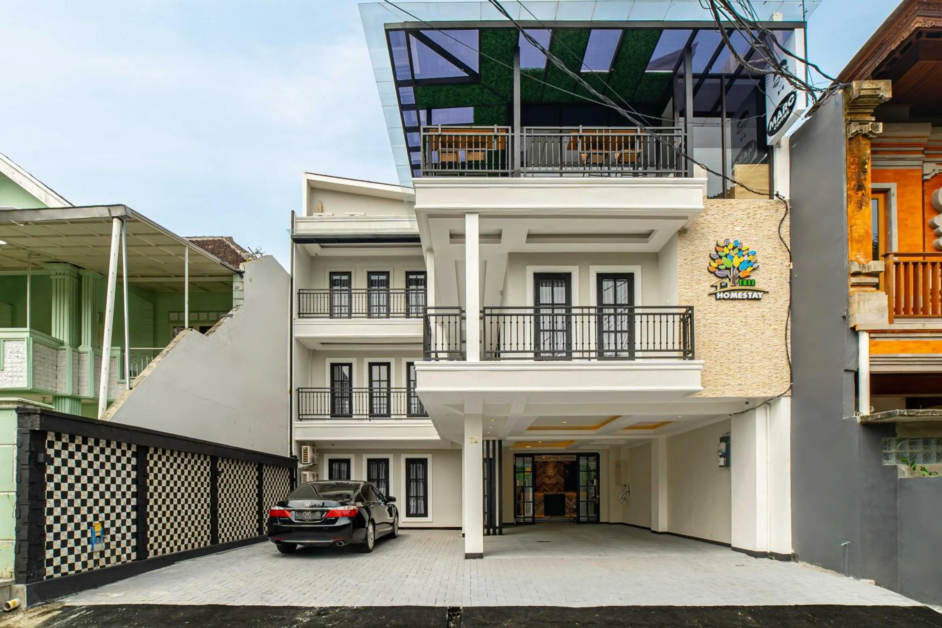 Property building in Tree Homestay Mitra RedDoorz