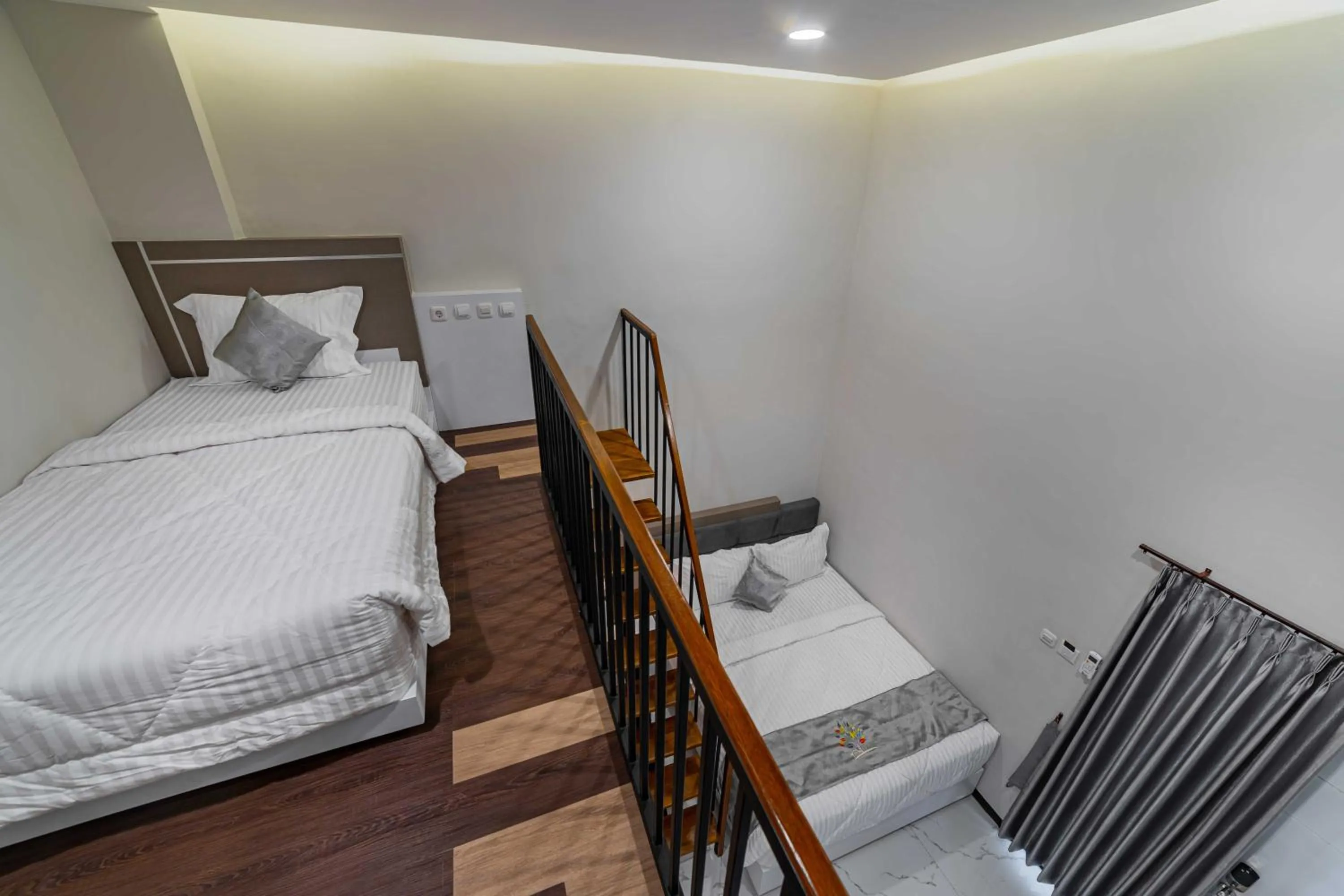 Bedroom, Bed in Tree Homestay Mitra RedDoorz