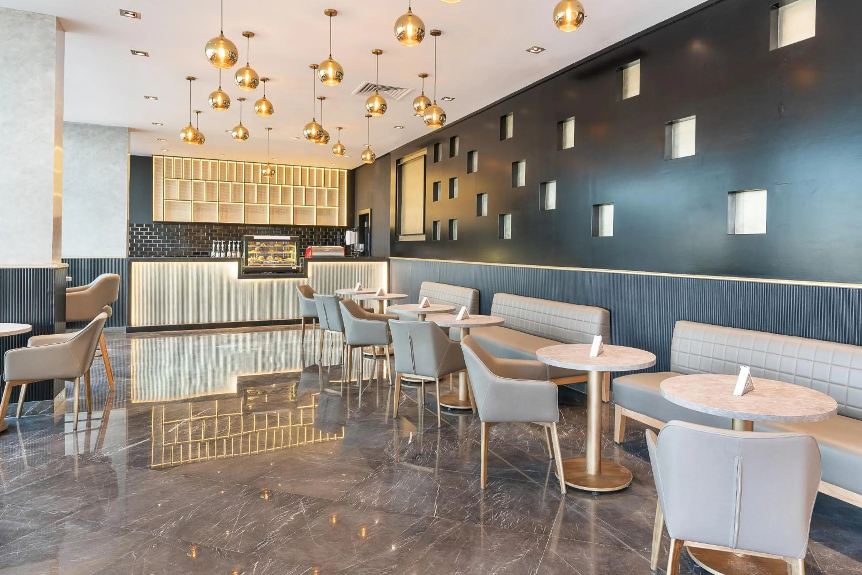 Lounge or bar in Rhactus Hotel, New Alamein