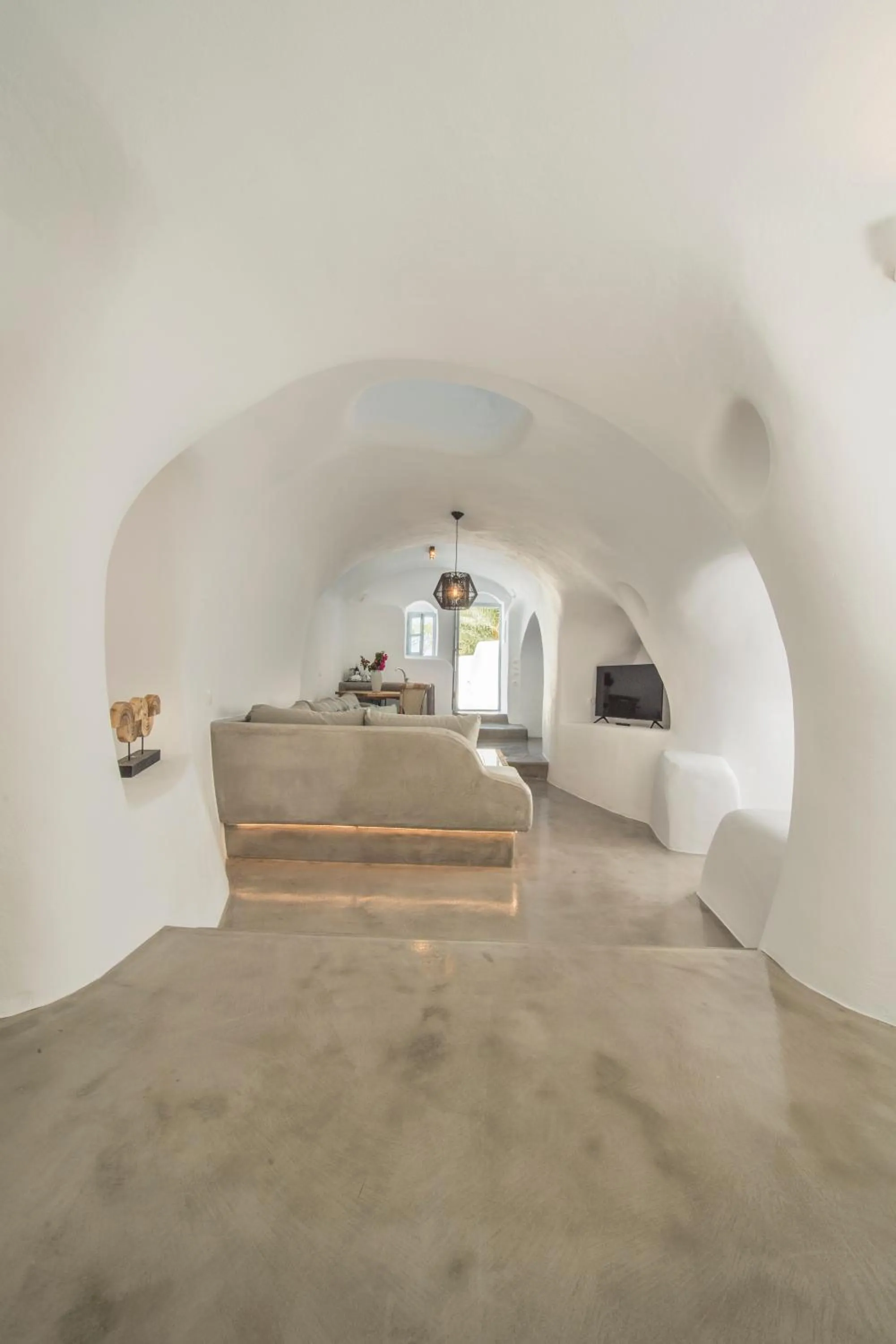 Bed in AQUA SERENITY LUXURY SUITES SANTORINI