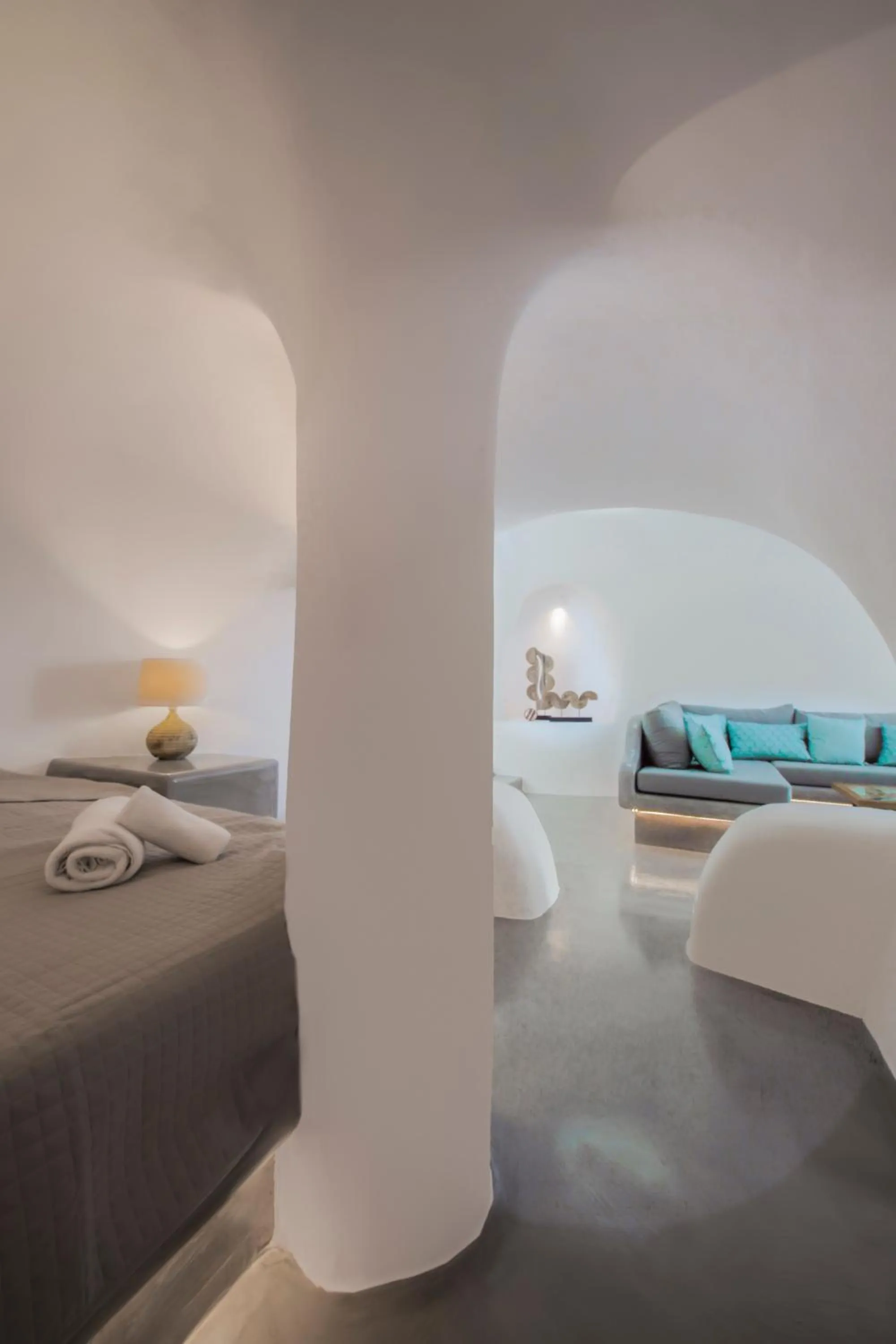 Bed in AQUA SERENITY LUXURY SUITES SANTORINI