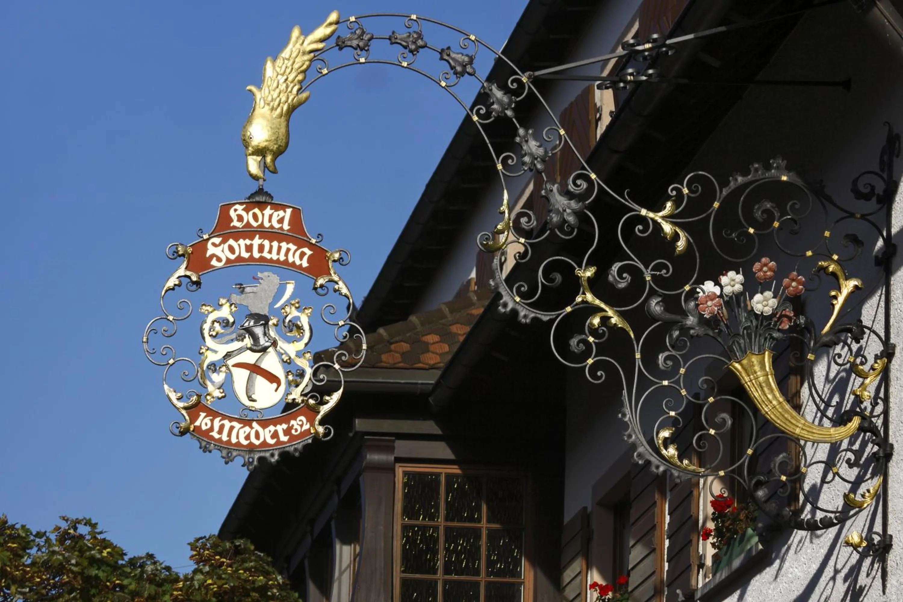 Logo/Certificate/Sign in Hotel Fortuna