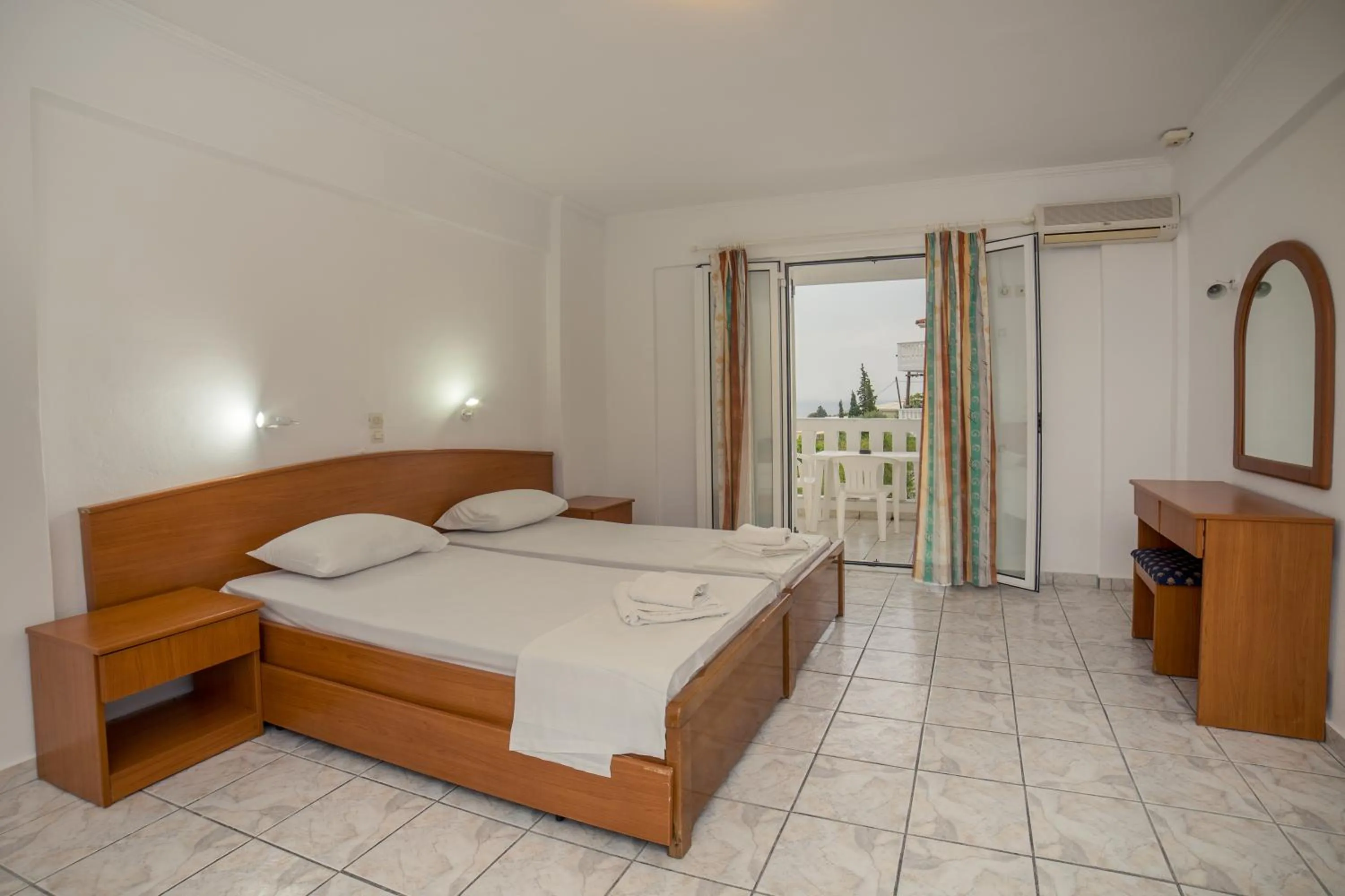 Photo of the whole room, Bed in All In Krinas Apart-Hotel