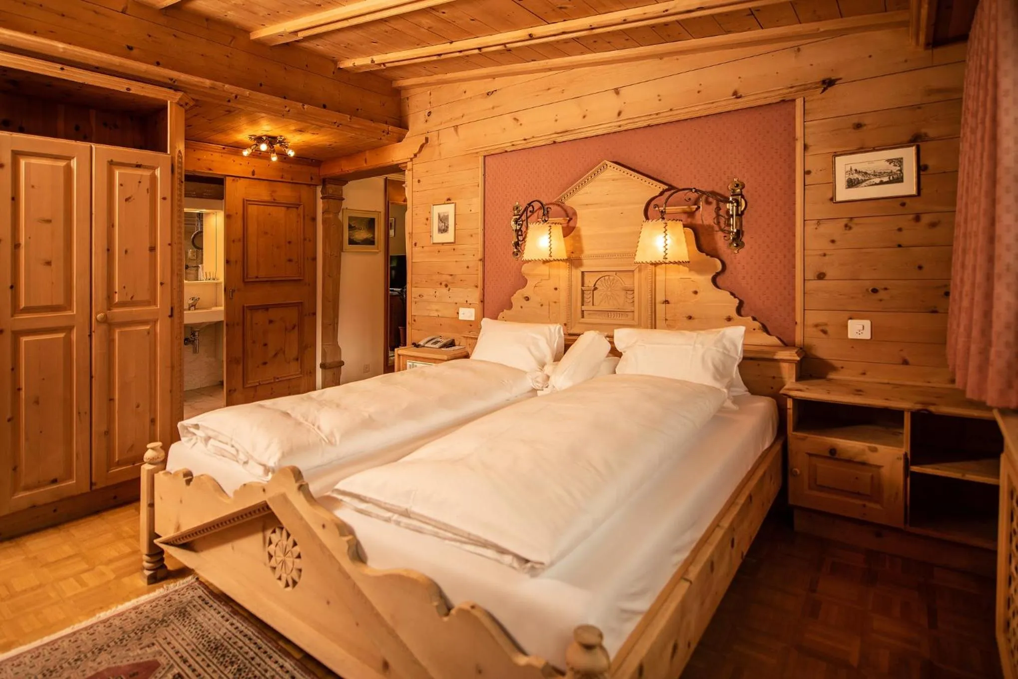Photo of the whole room, Bed in Relais & Châteaux Schlosshotel Chastè - Scuol Tarasp