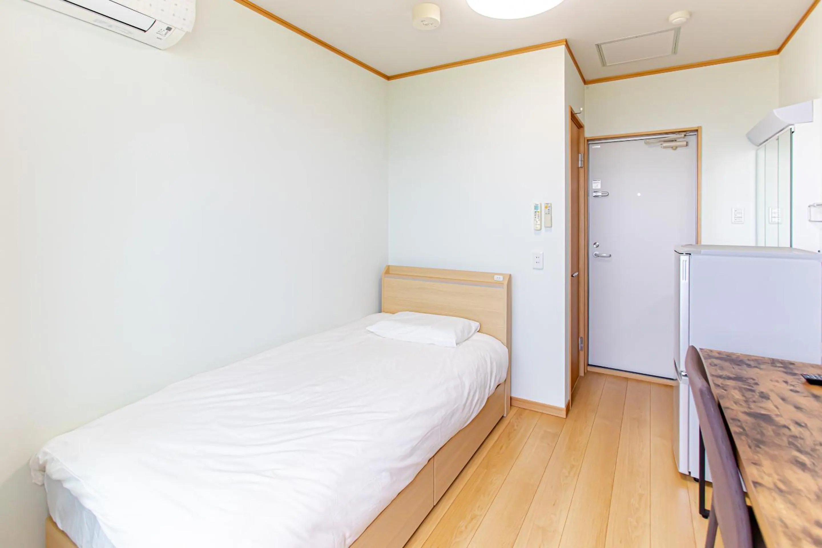 Bed in Tabist Hotel Takagiya Iwaki