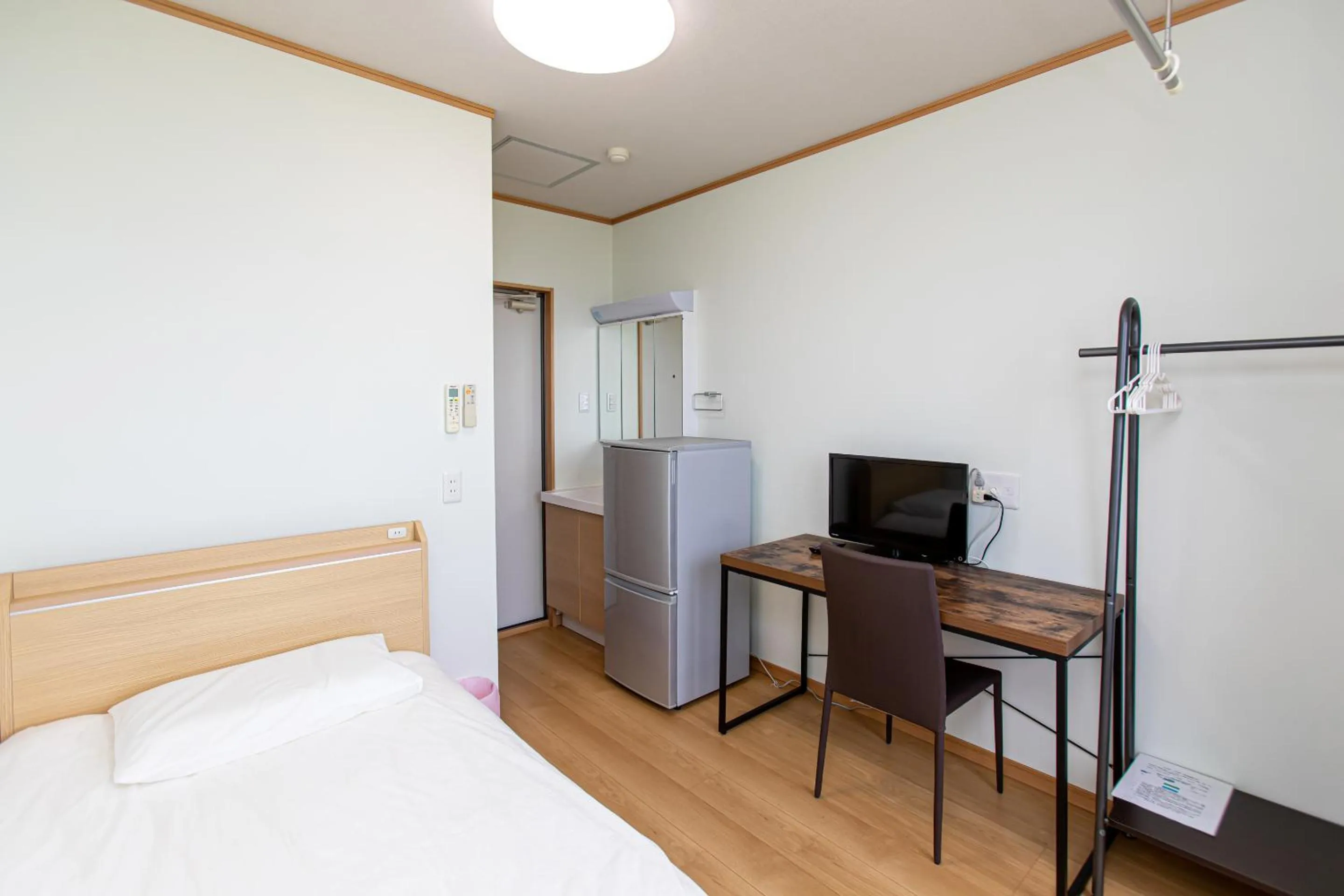 Bed in Tabist Hotel Takagiya Iwaki