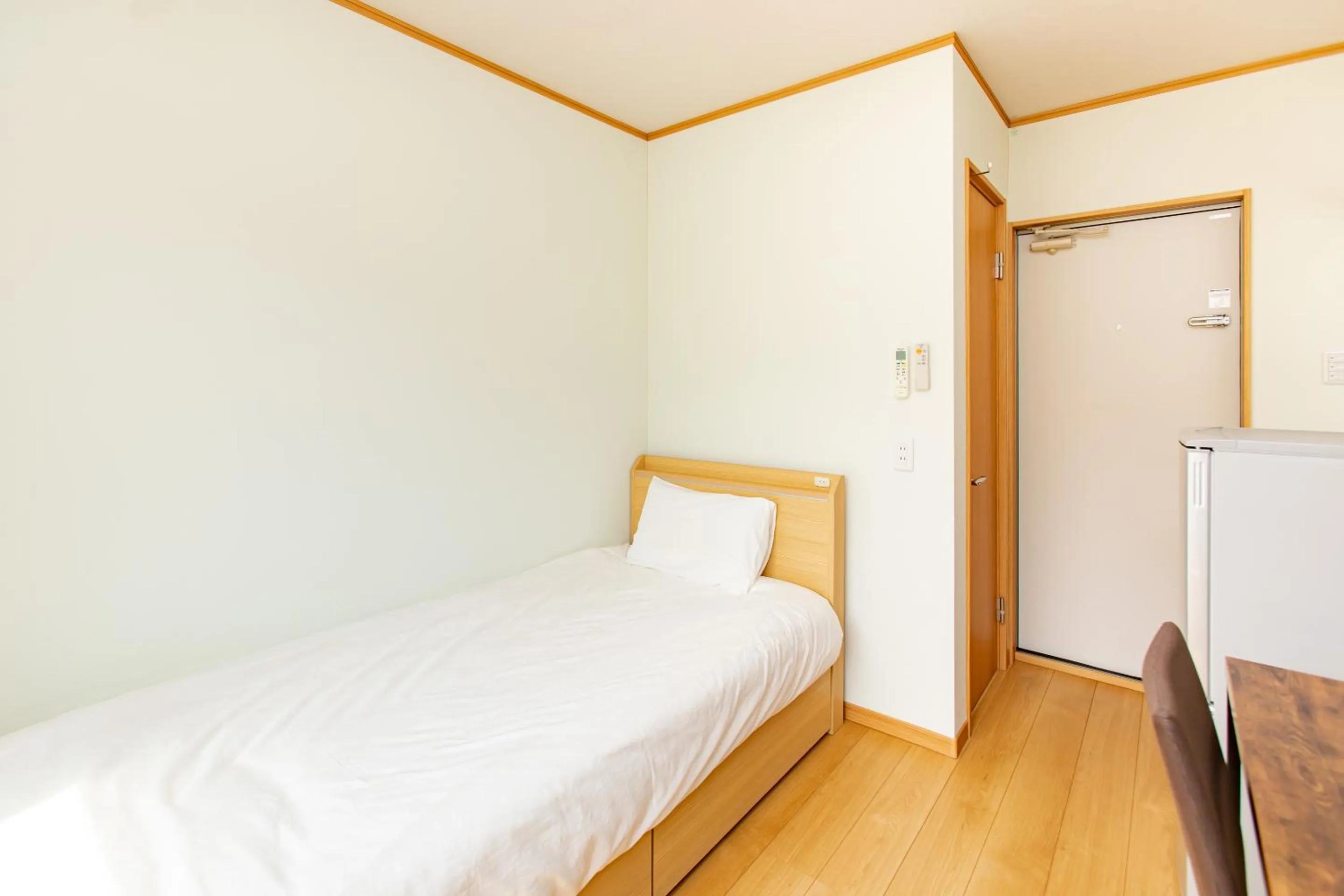 Bed in Tabist Hotel Takagiya Iwaki