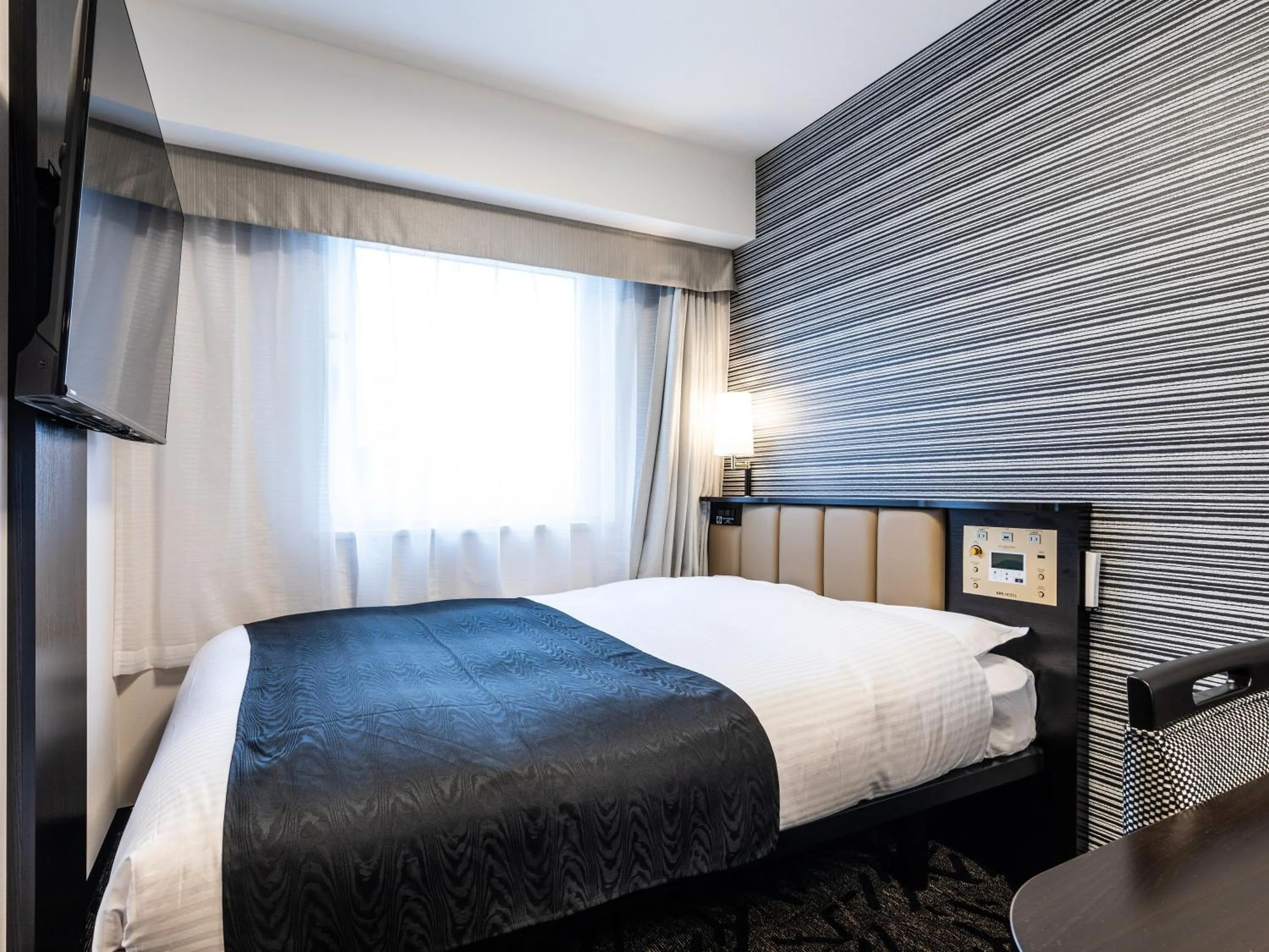 Bed in APA Hotel Kintetsu-Nara Ekimae