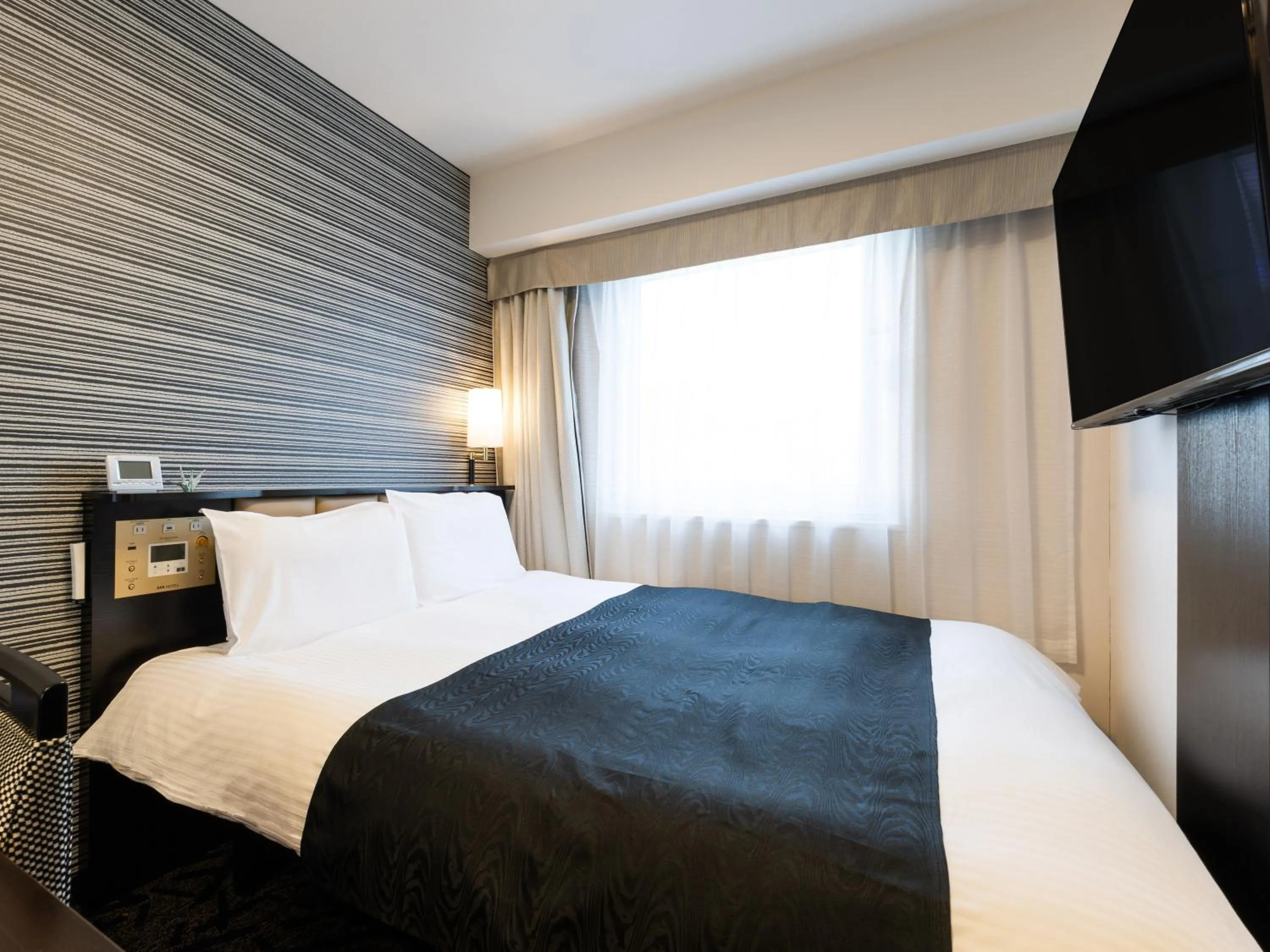 Photo of the whole room, Bed in APA Hotel Kintetsu-Nara Ekimae