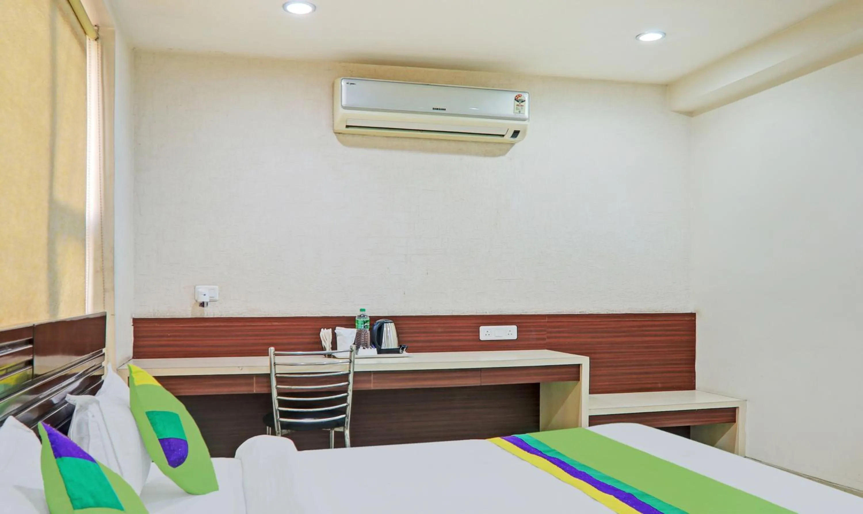 Bedroom, Bed in Treebo Elite City Upper Bazar