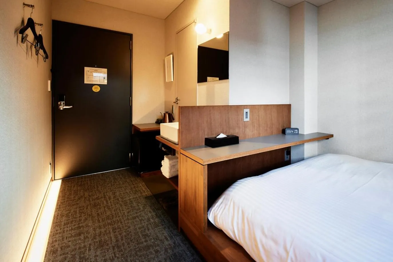 Bed in &HOTEL HAKATA