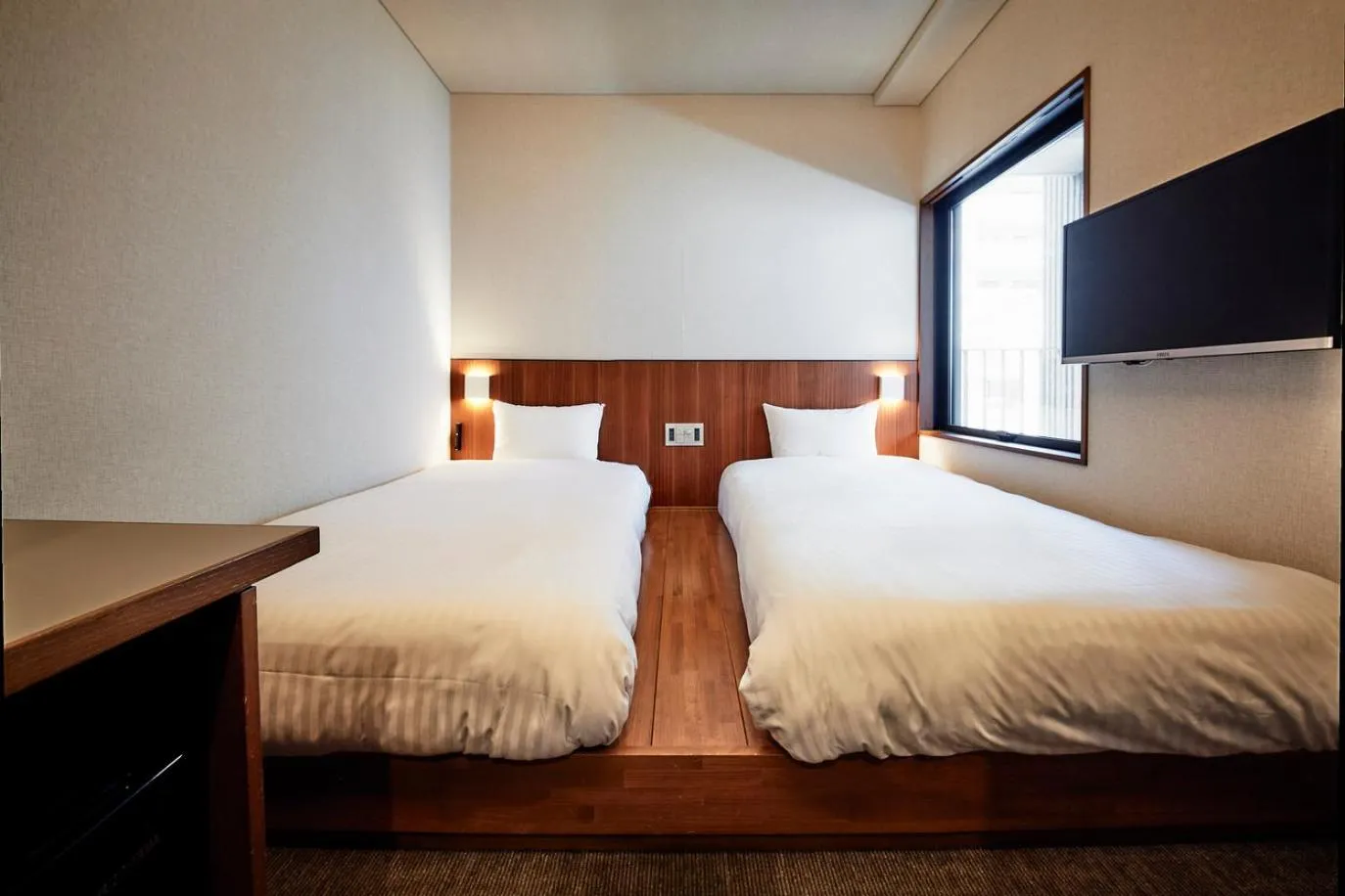Bed in &HOTEL HAKATA