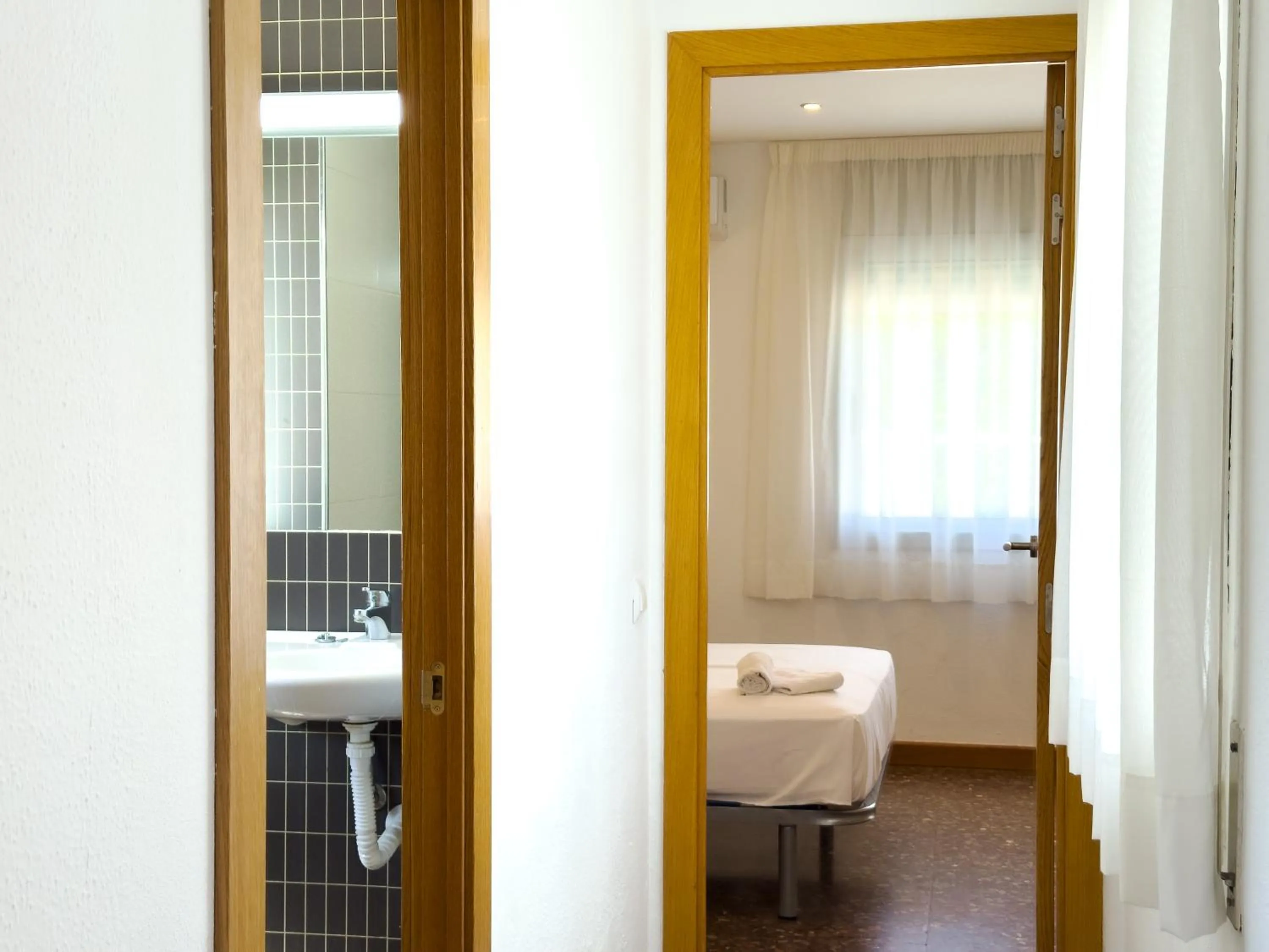 Bed in Rentalmar Atlantida Atico